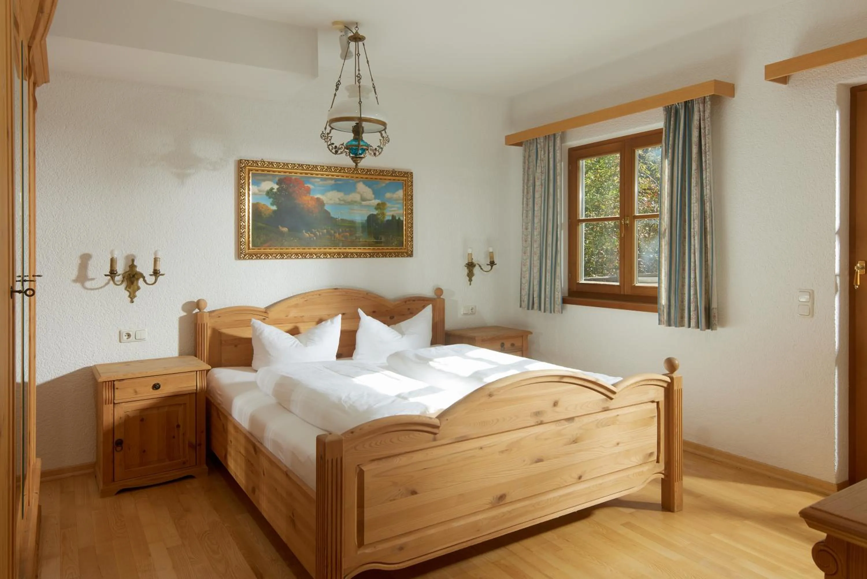 Bed in Alt Montafon Hotel Appartements by Pferd auf Wolke