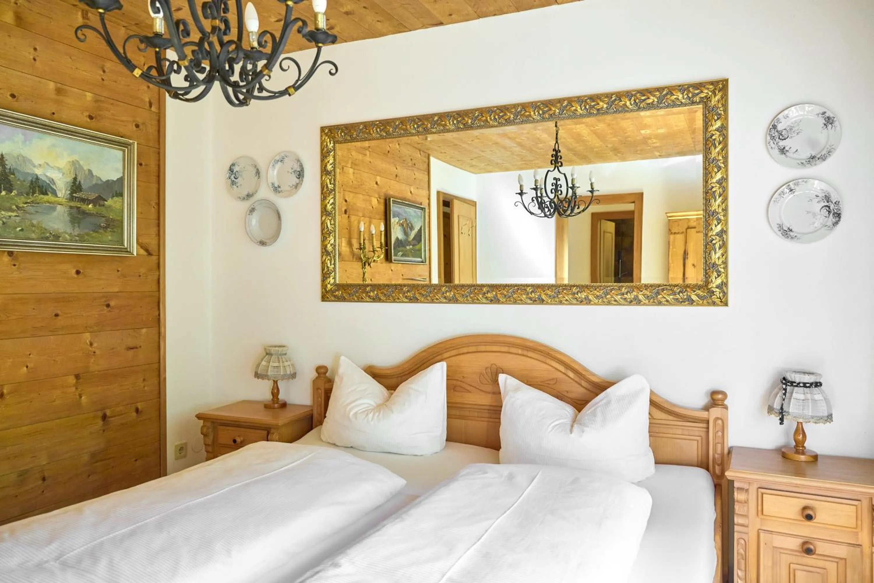 Bed in Alt Montafon Hotel Appartements by Pferd auf Wolke