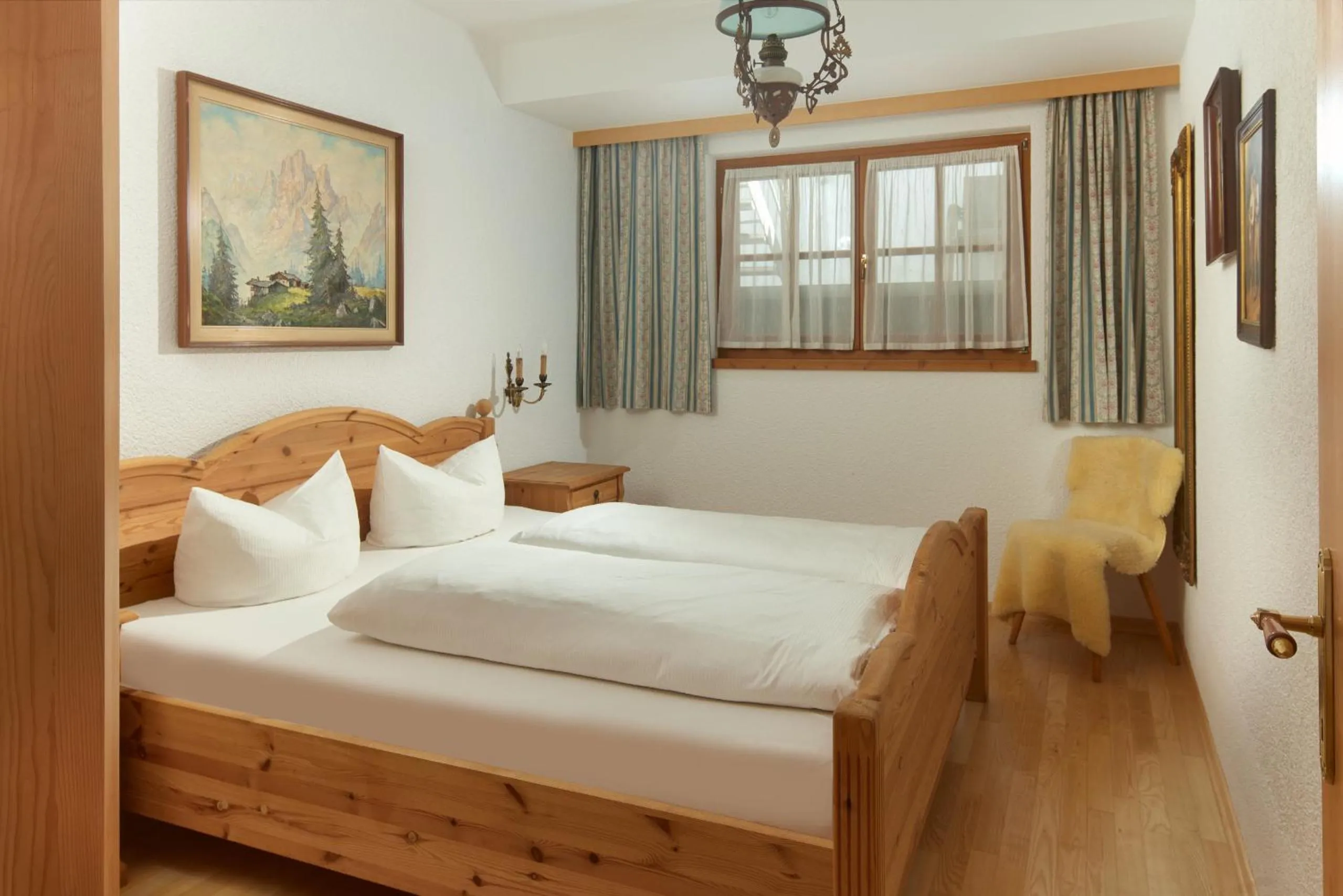 Bed in Alt Montafon Hotel Appartements by Pferd auf Wolke