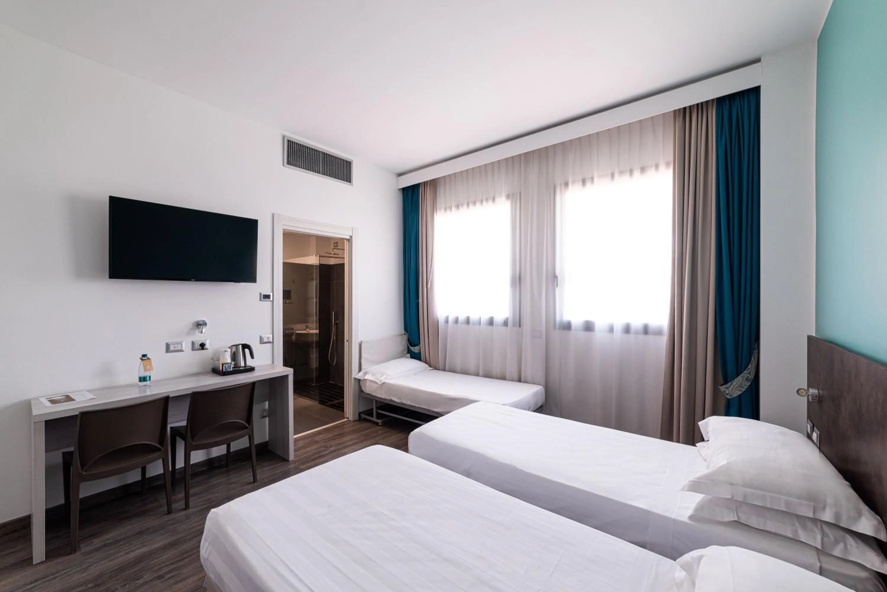 Bed in Phi Hotel Milano