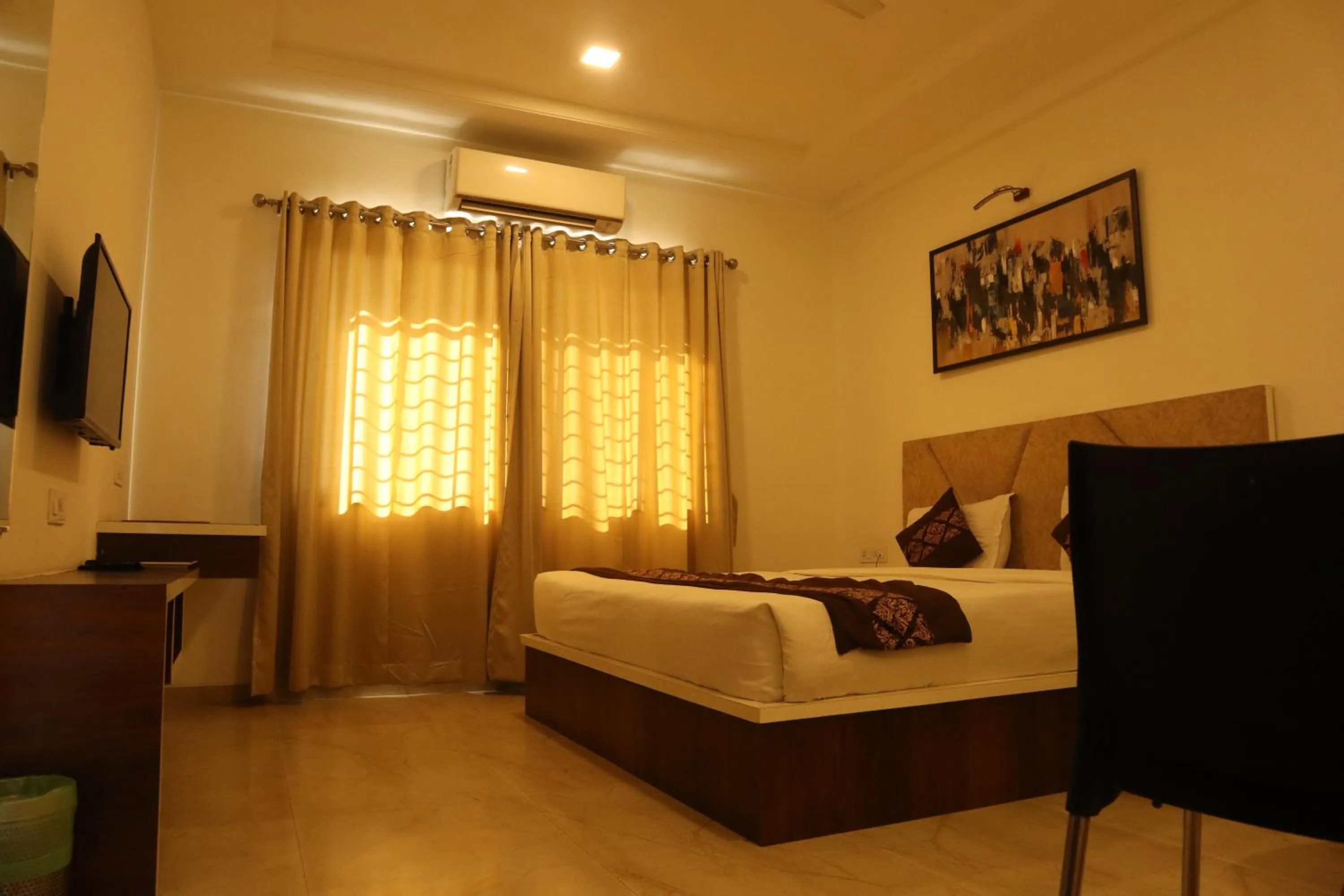 Bed in Hotel Grand Ecotel, Aurangabad