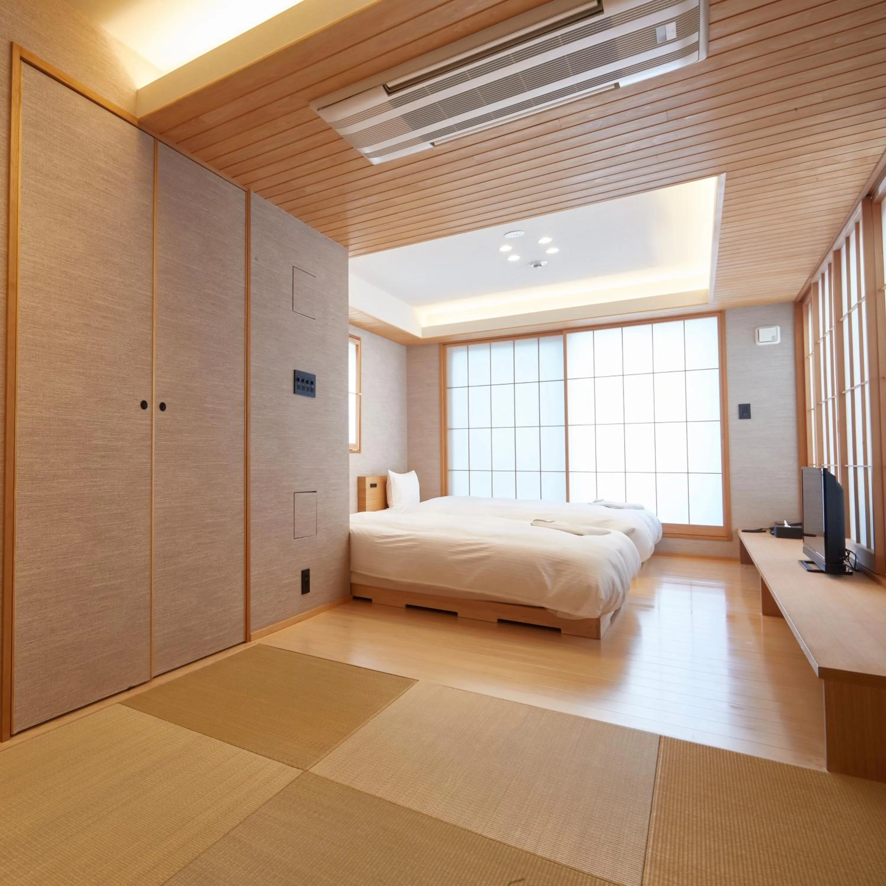 Bed in KAMAKURA Hotel