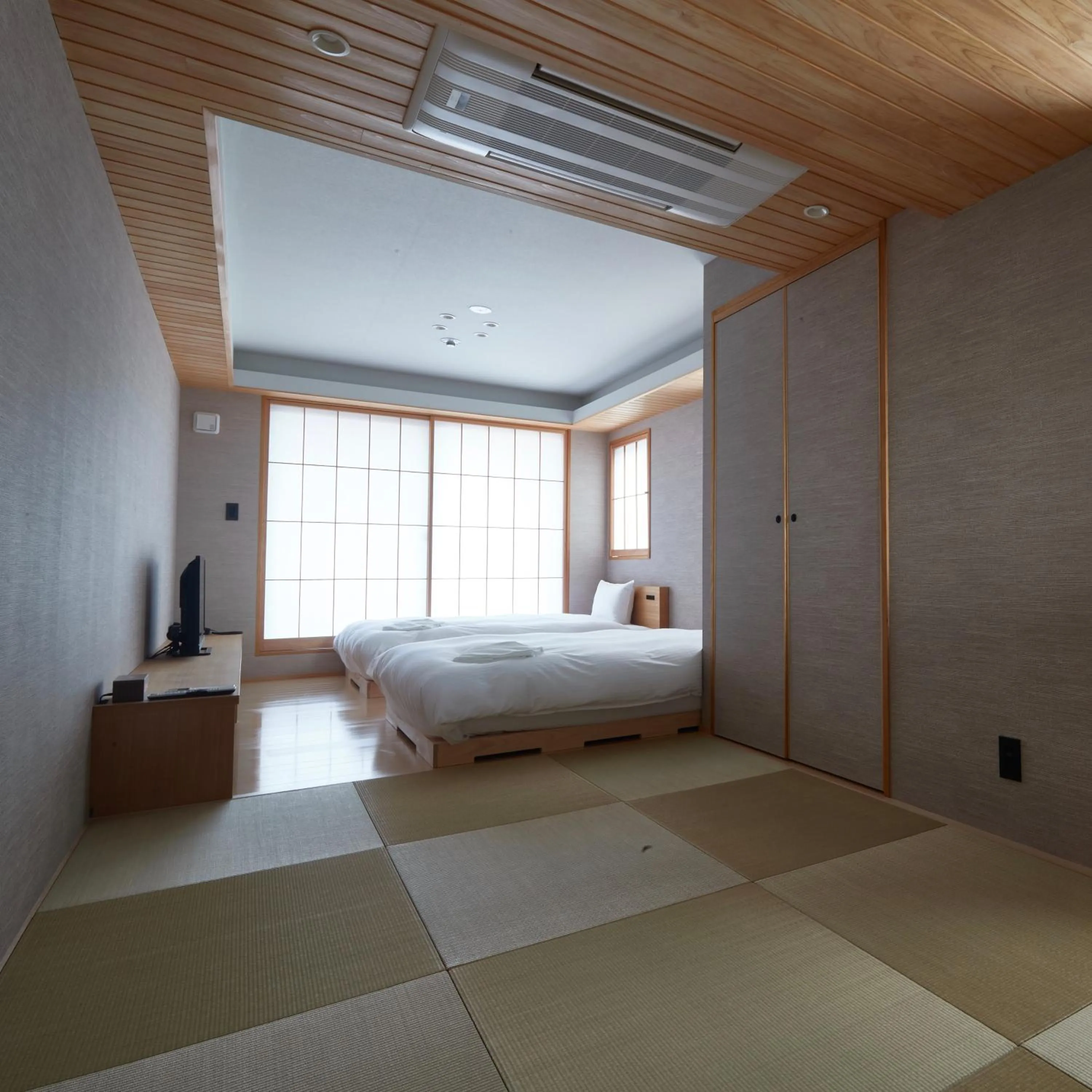 Bed in KAMAKURA Hotel