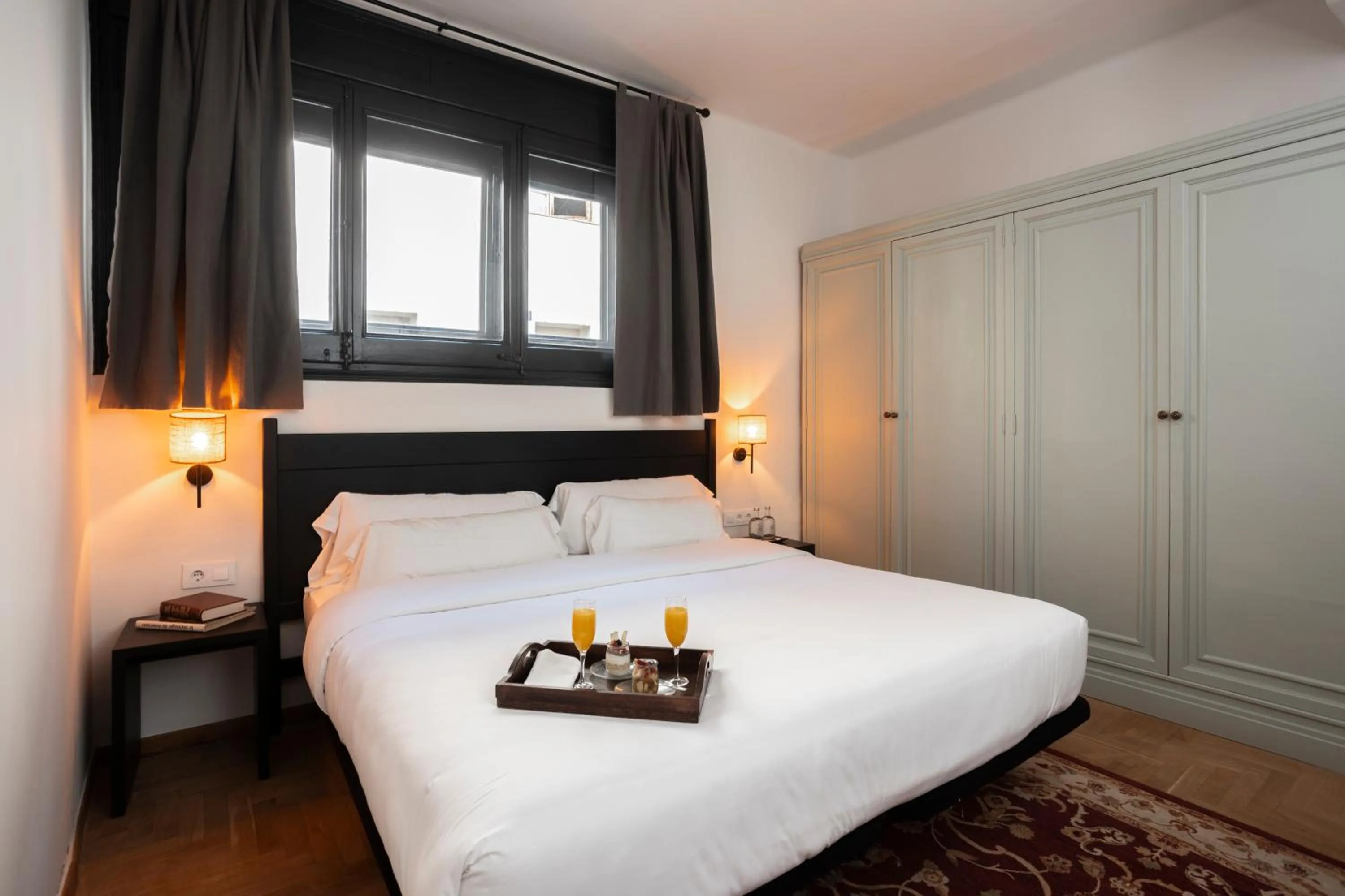 Property building, Bed in Angelats Hotel - A Signature Boutique Hotel