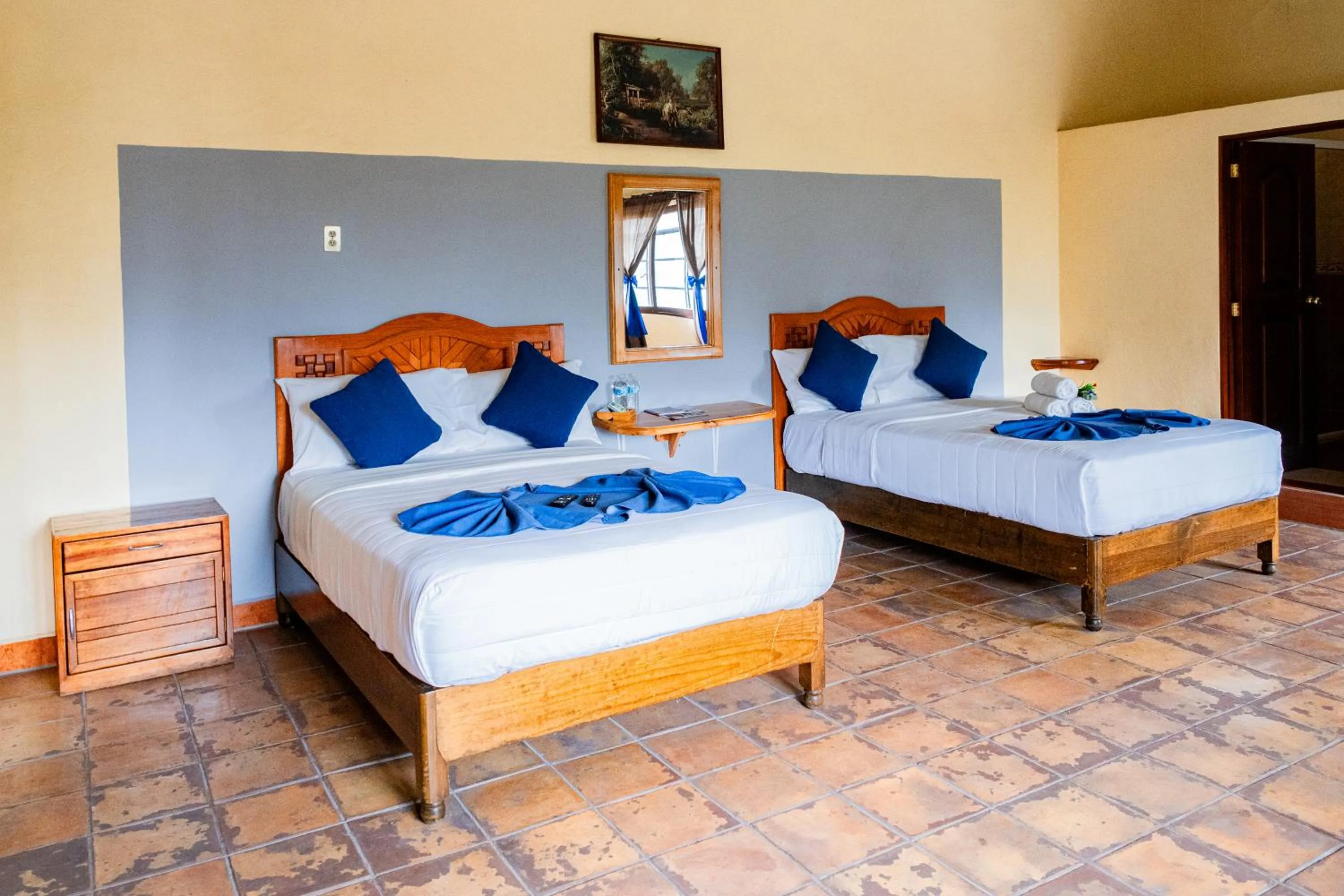 Bed in HOTEL EX HACIENDA EL MOLINO