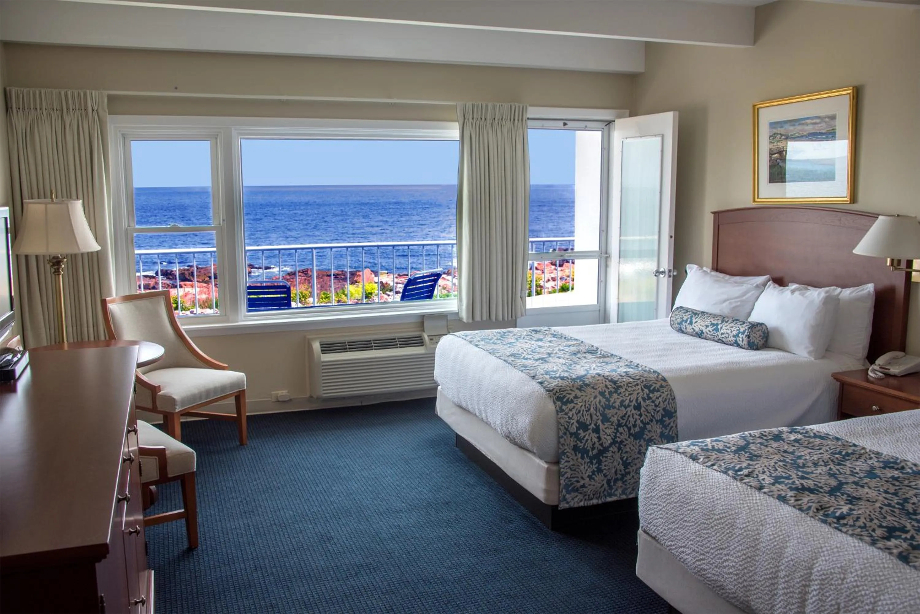 Bed in Atlantis Oceanfront Inn Gloucester