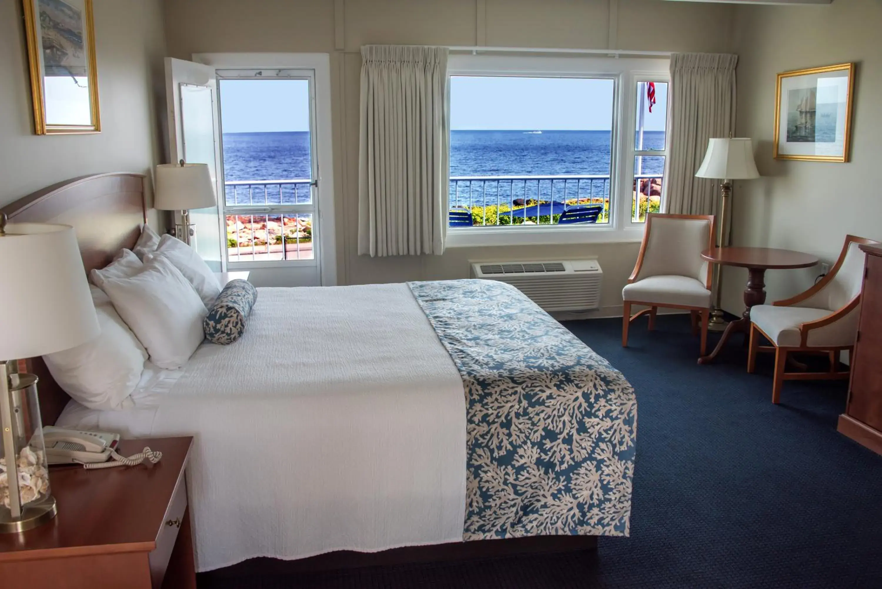 Deluxe King Room with Balcony and Ocean View in Atlantis Oceanfront Inn Gloucester Deluxe King Room with Balcony and Ocean View in Atlantis Oceanfront Inn Gloucester