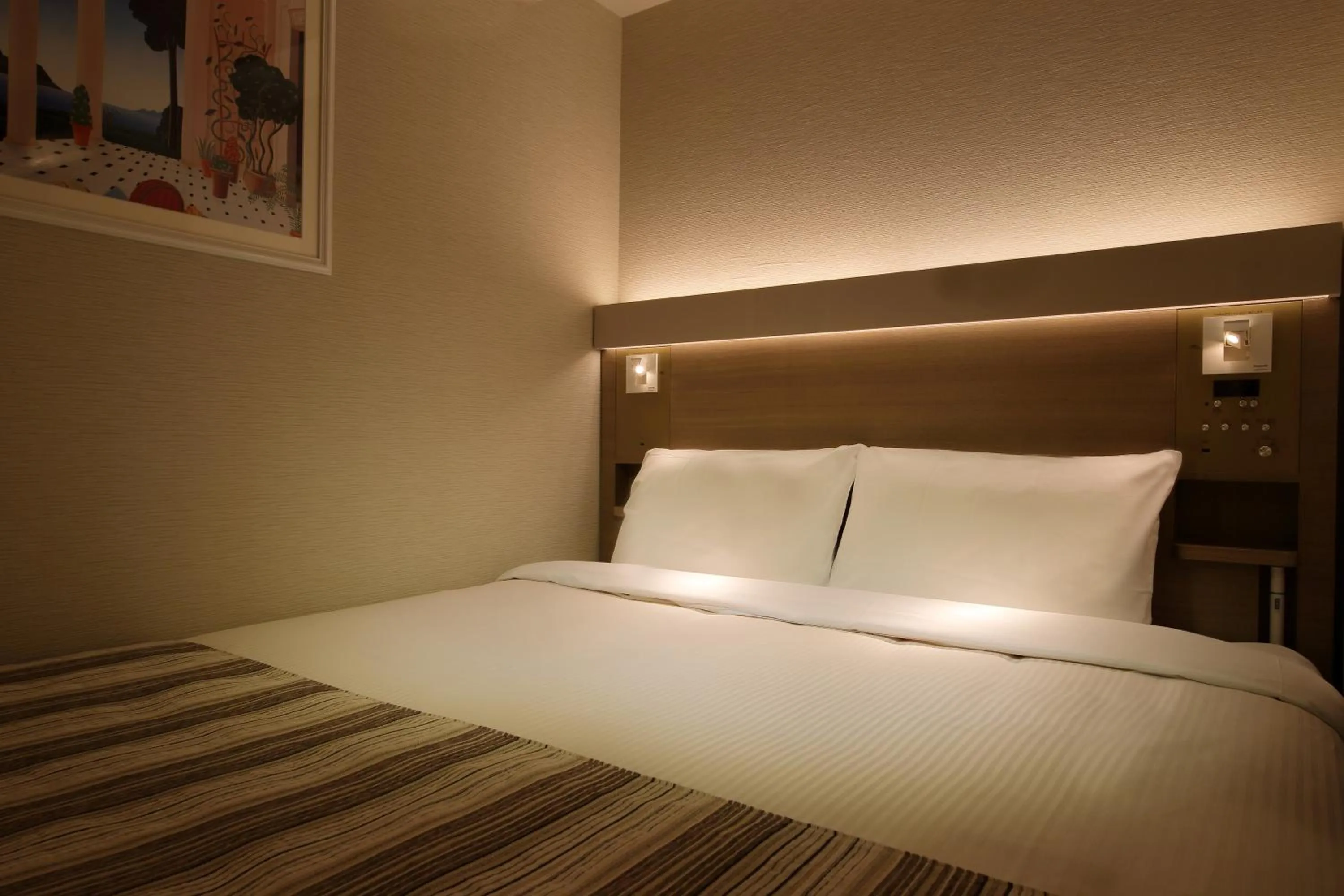 Bed in Keio Presso Inn Otemachi