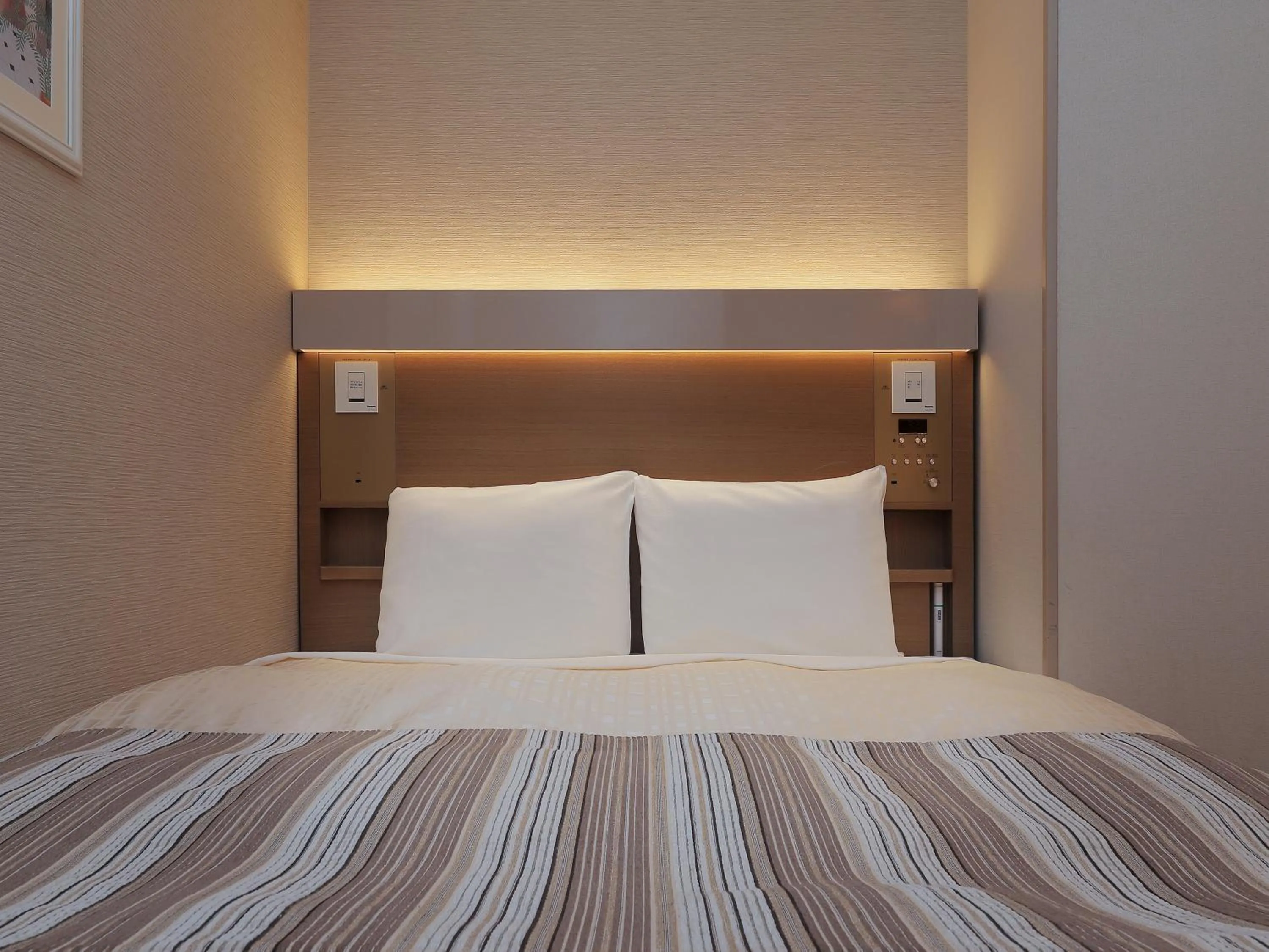 Bed in Keio Presso Inn Otemachi