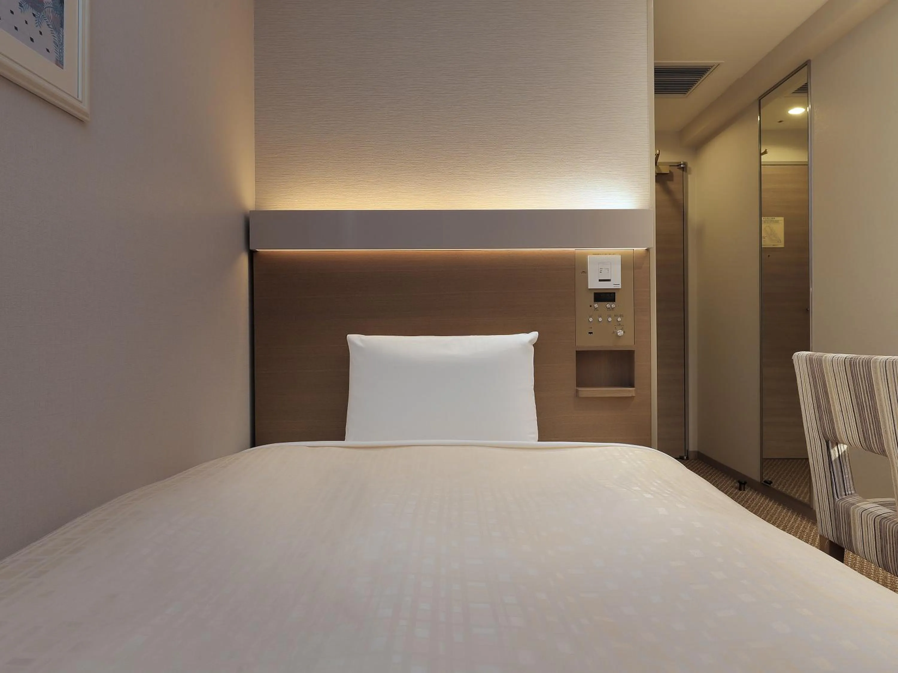 Bed in Keio Presso Inn Otemachi