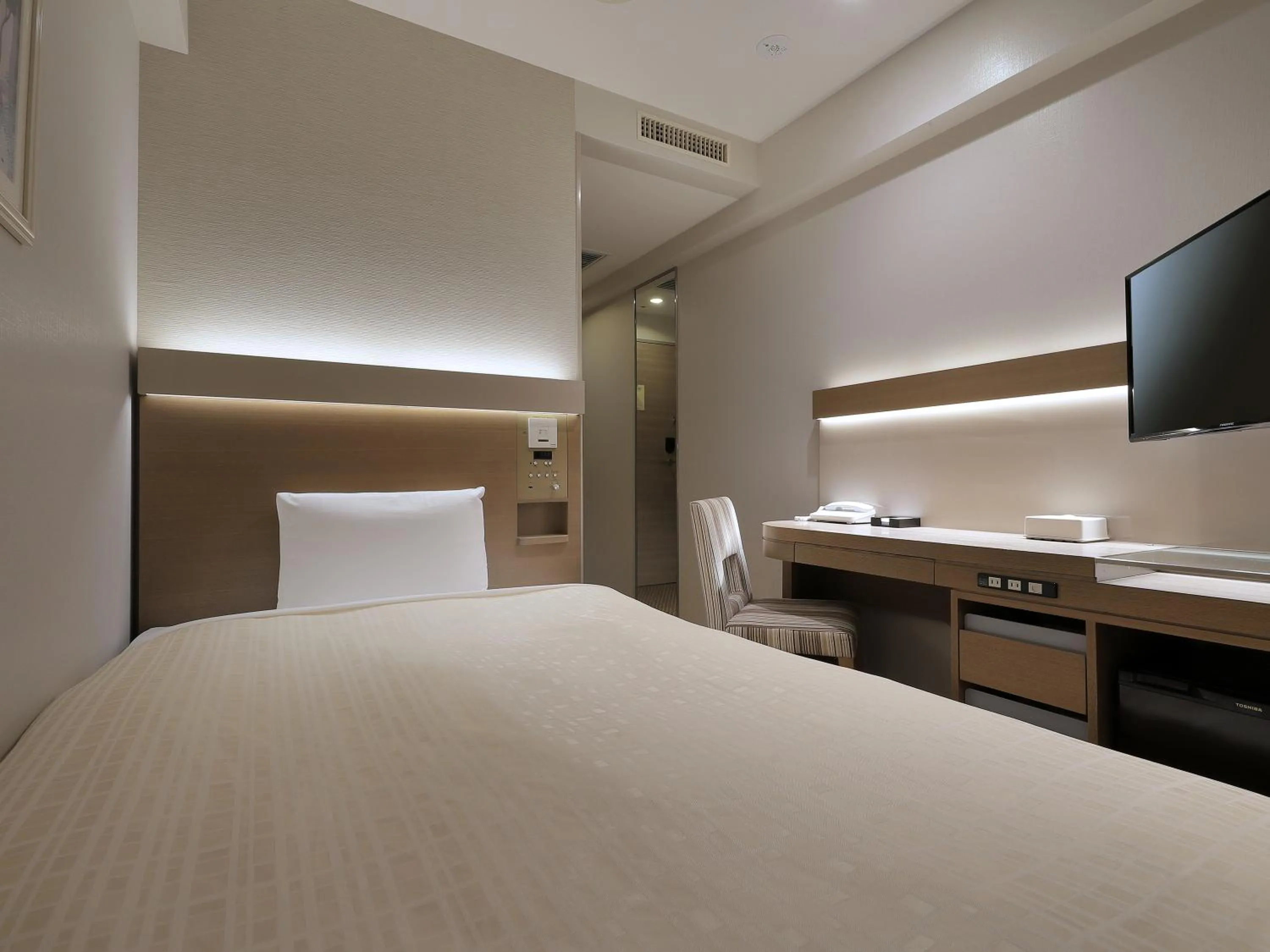 Bed in Keio Presso Inn Otemachi