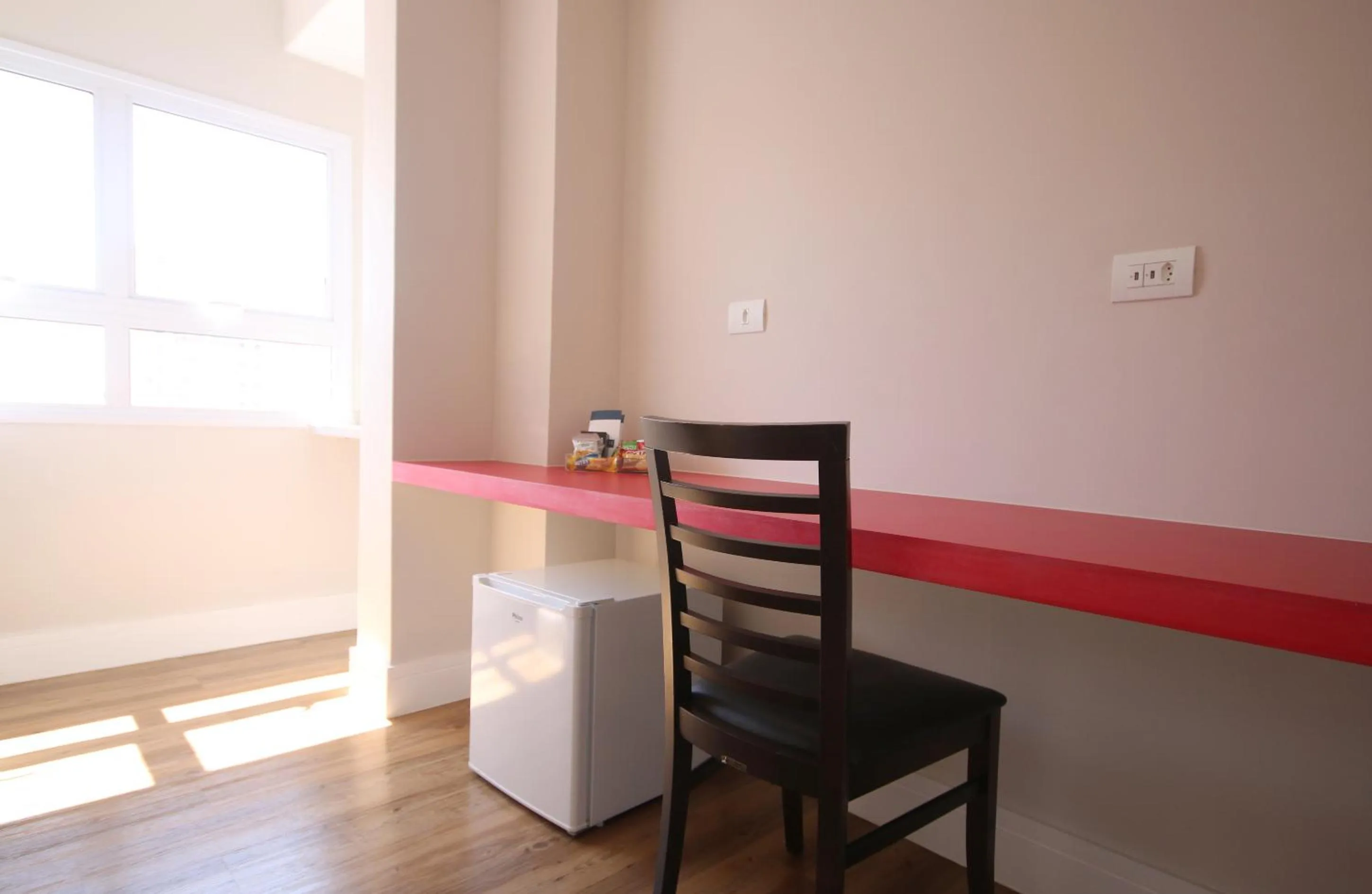 Photo of the whole room in Ez Aclimação Hotel