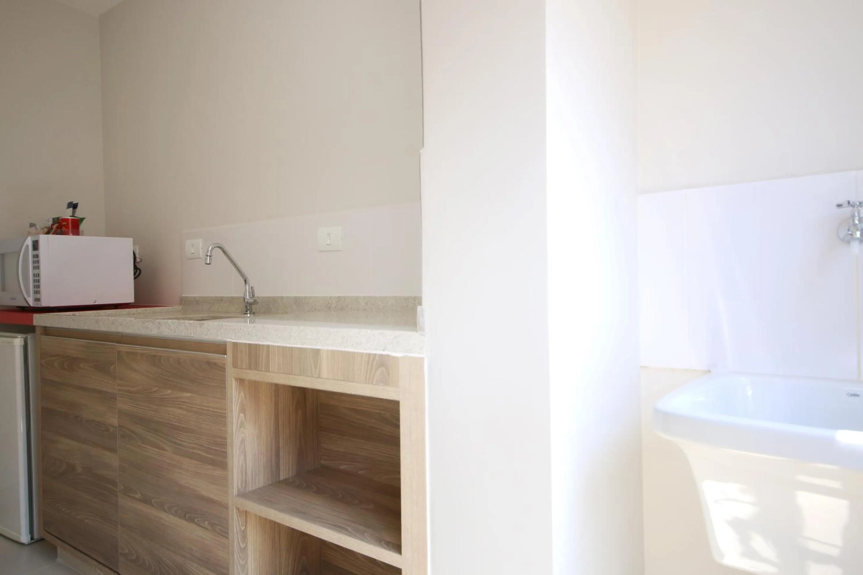 Photo of the whole room in Ez Aclimação Hotel