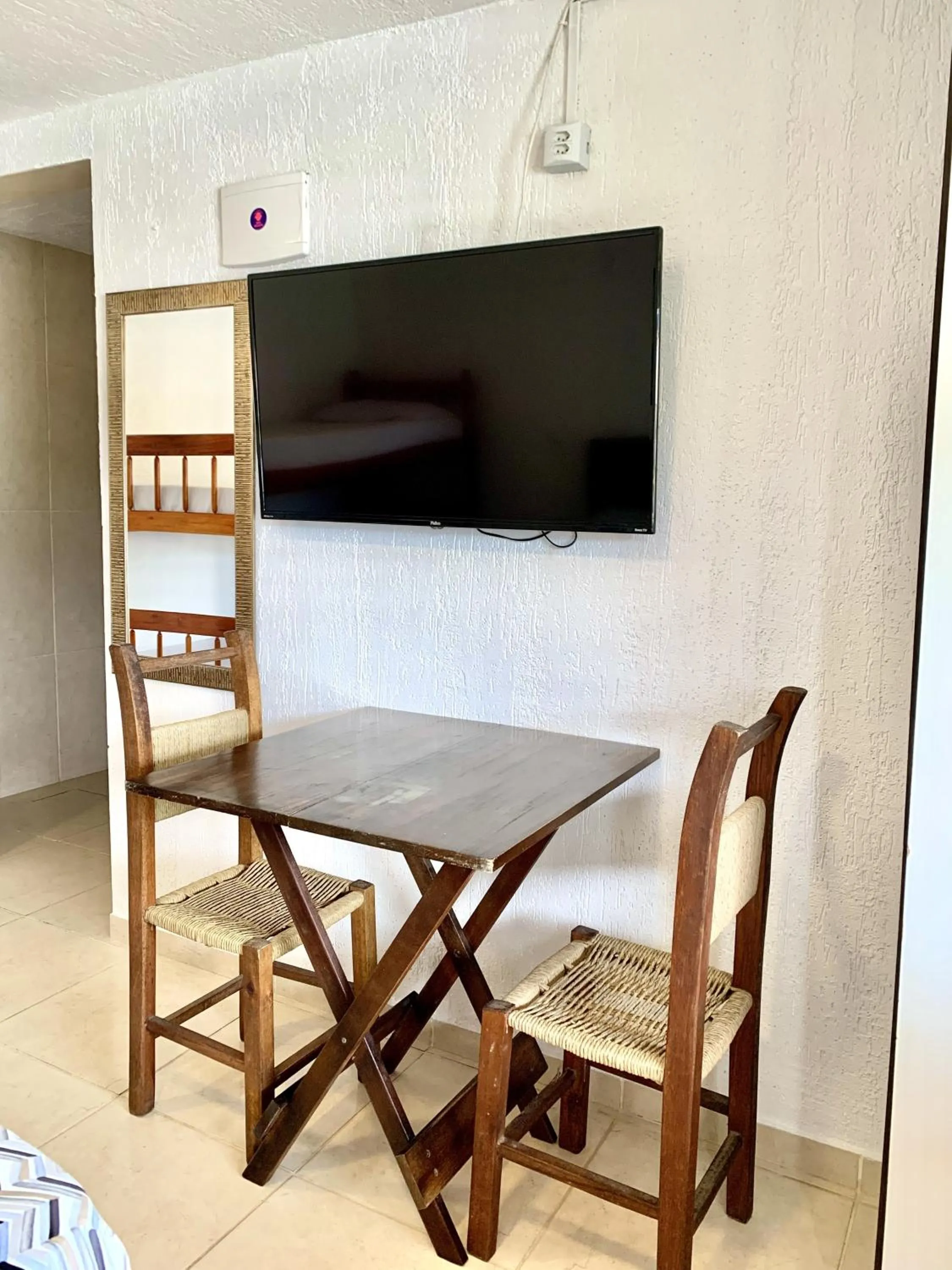 Communal lounge/ TV room in Pousada Lagoa Encantada