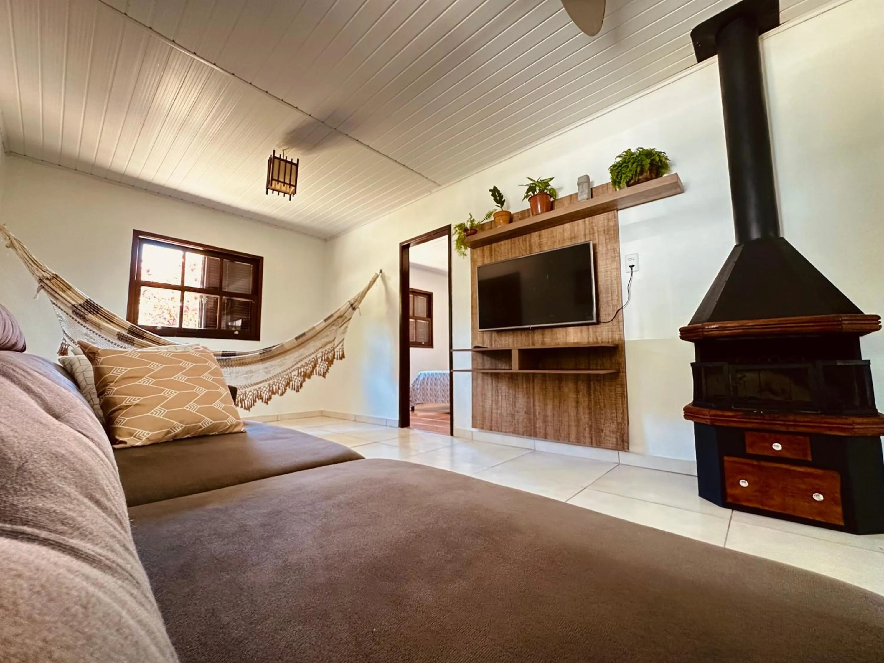 Communal lounge/ TV room in Pousada Lagoa Encantada