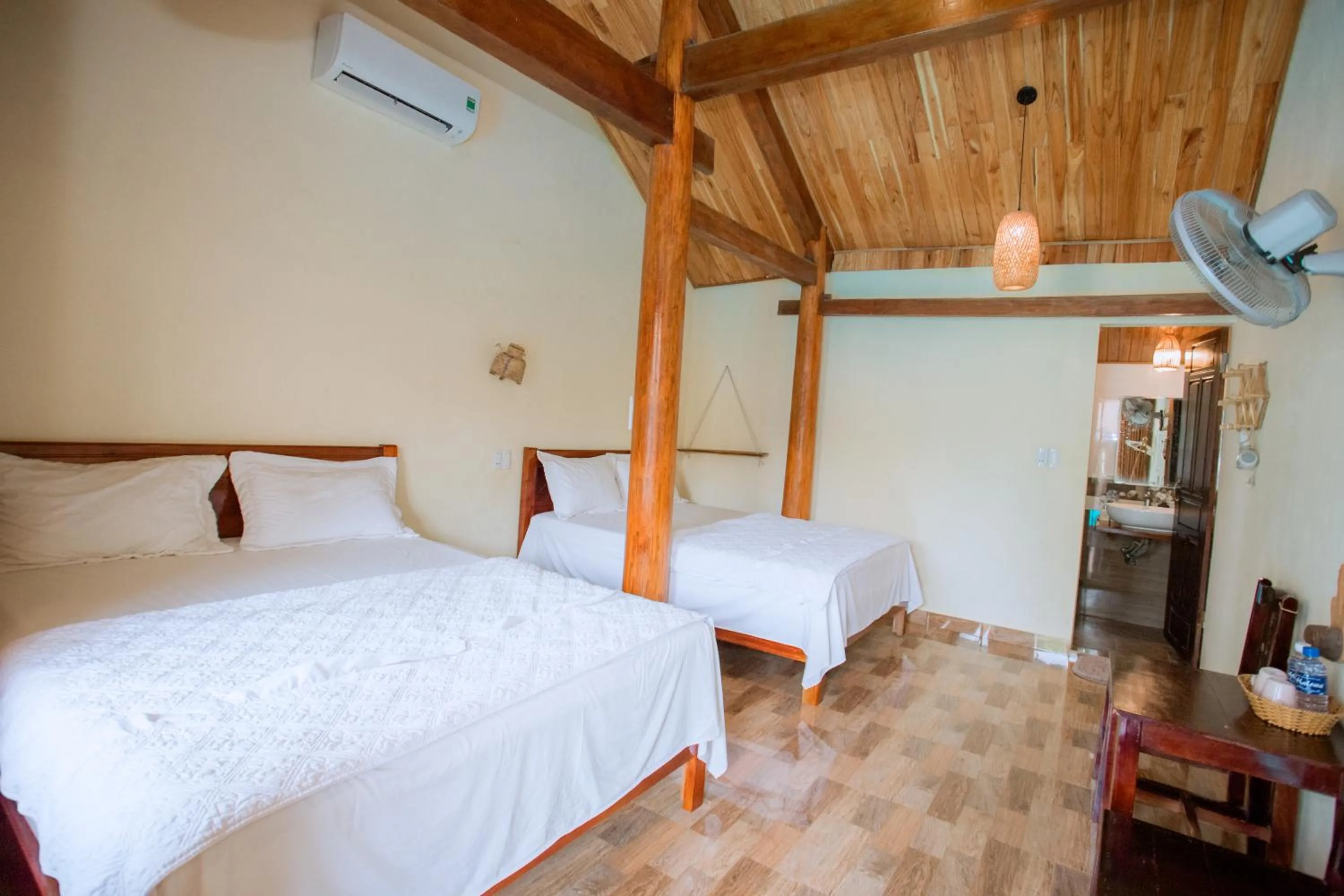 Photo of the whole room, Bed in Phong Nha Ecolodge Homestay & Tours - Mountain View