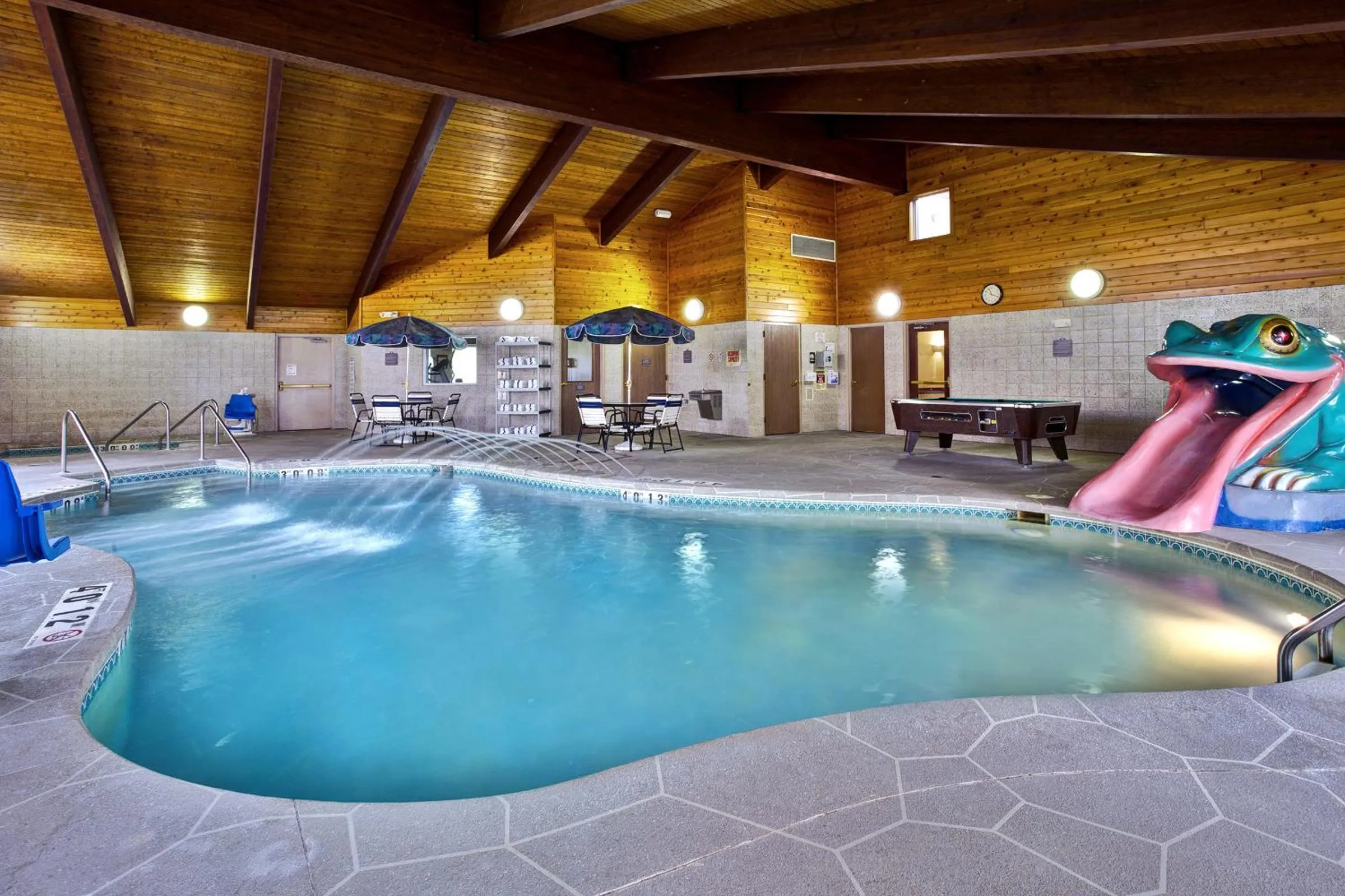 Swimming pool in AmericInn by Wyndham Beaver Dam