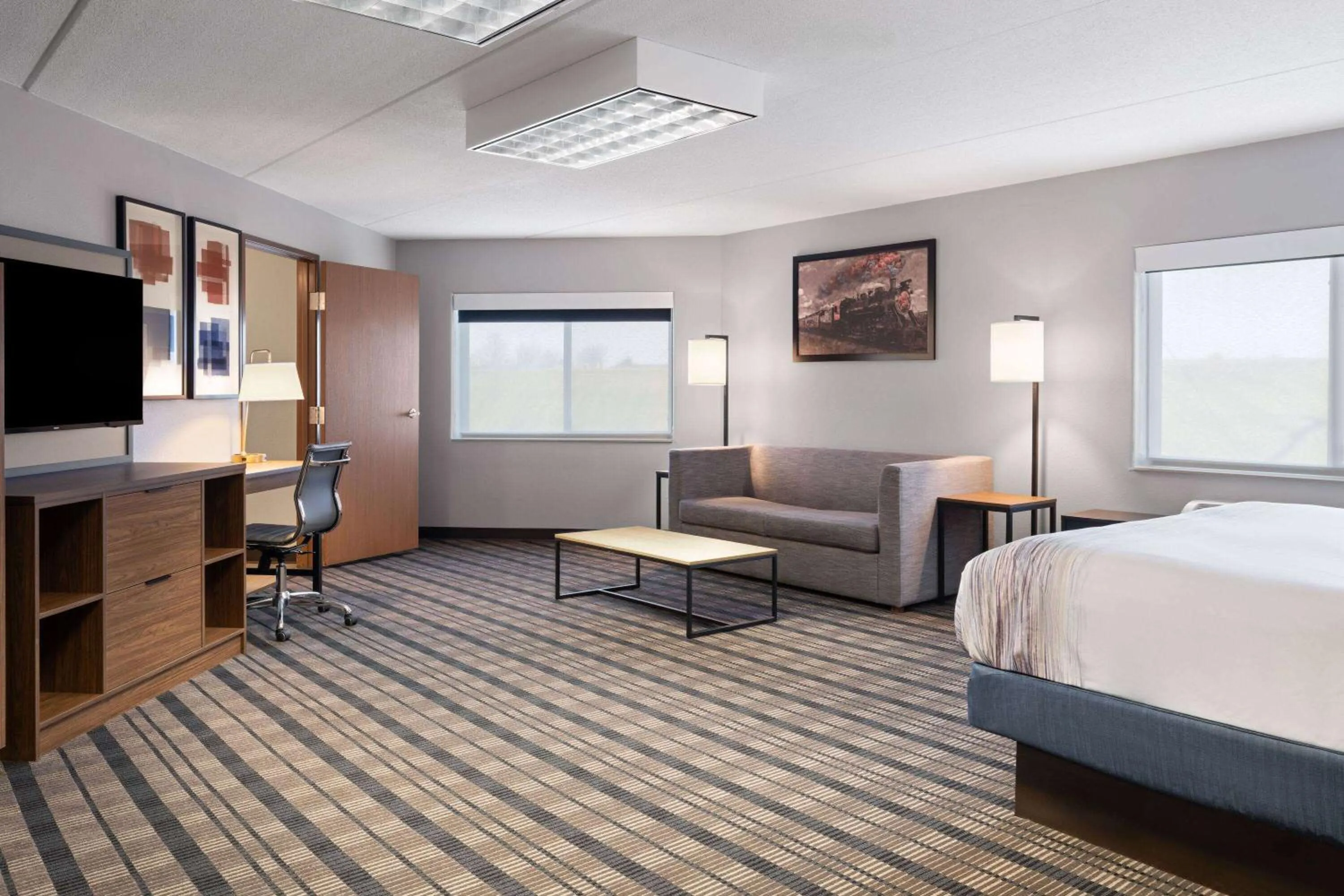 Photo of the whole room, Bed in AmericInn by Wyndham Beaver Dam