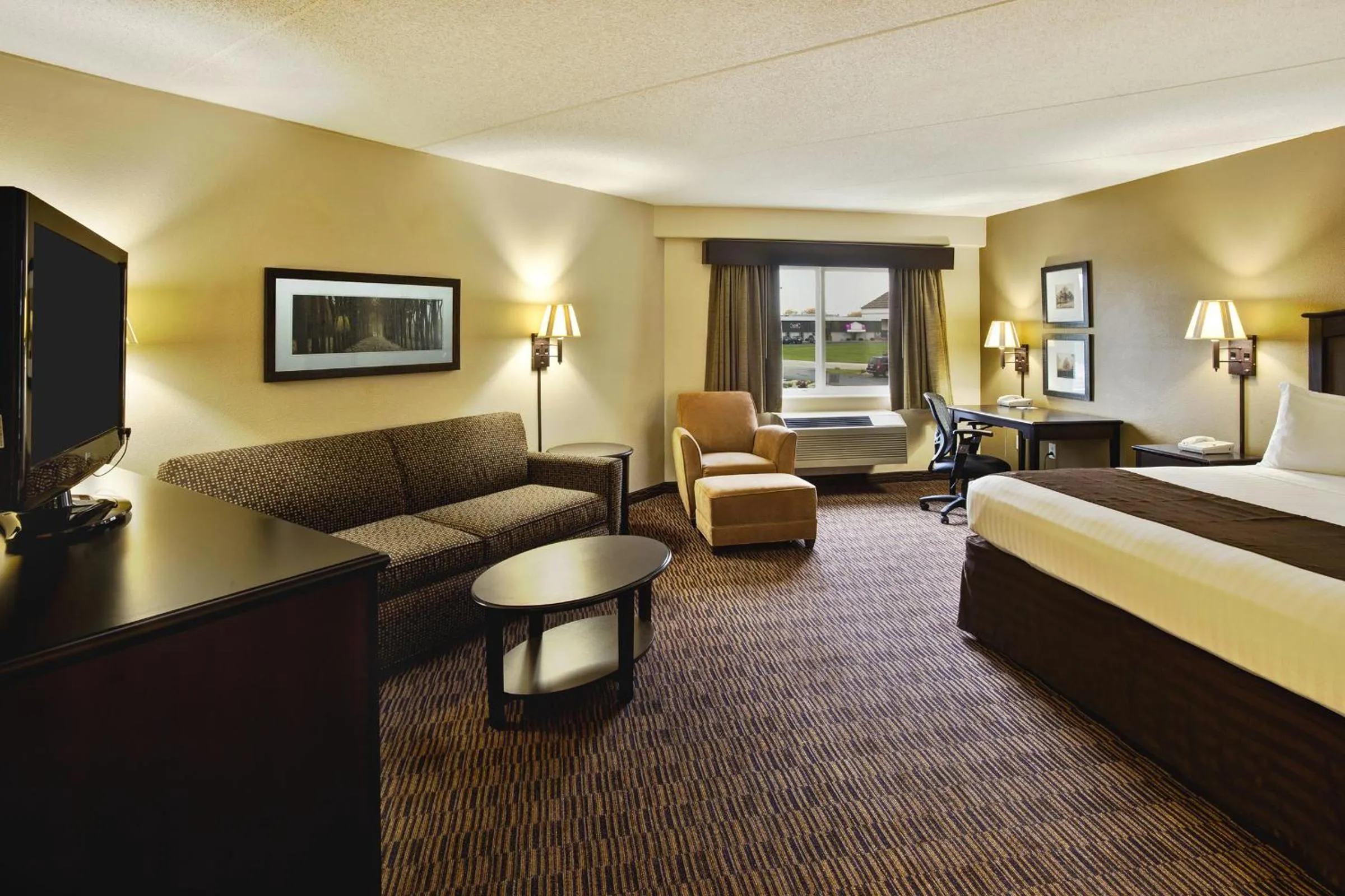 Photo of the whole room, Bed in AmericInn by Wyndham Beaver Dam