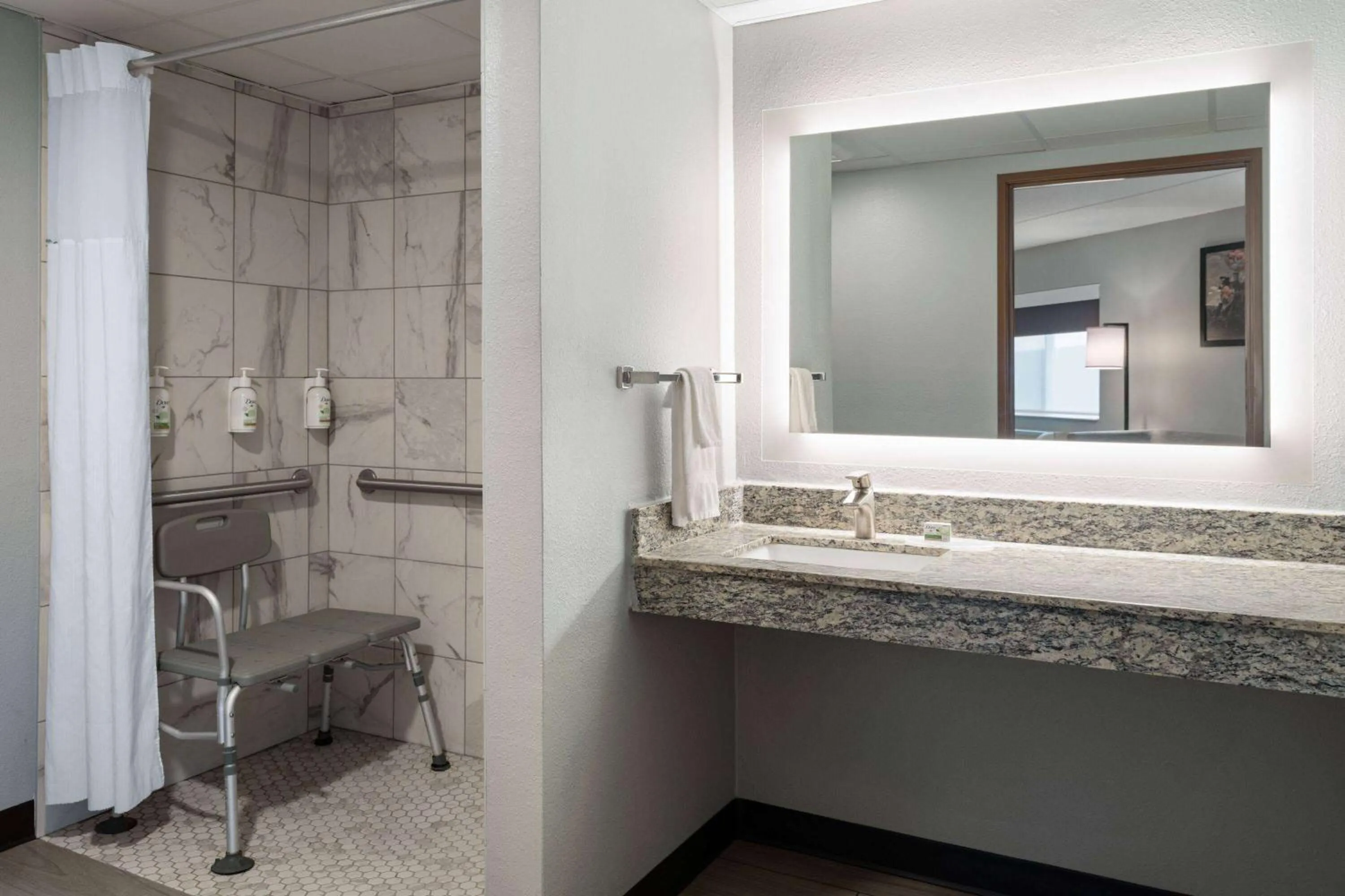 Shower in AmericInn by Wyndham Beaver Dam