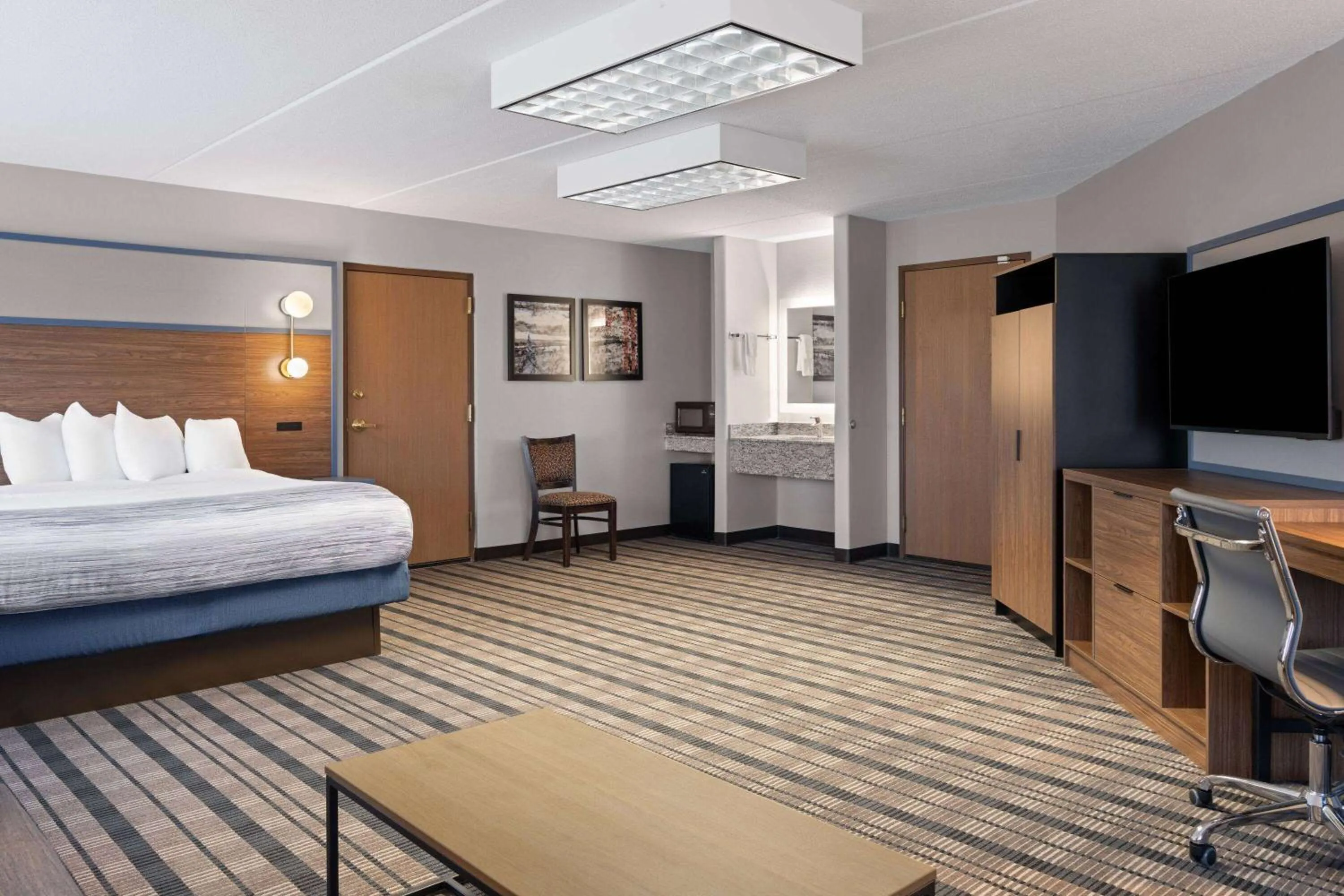 Photo of the whole room, Bed in AmericInn by Wyndham Beaver Dam