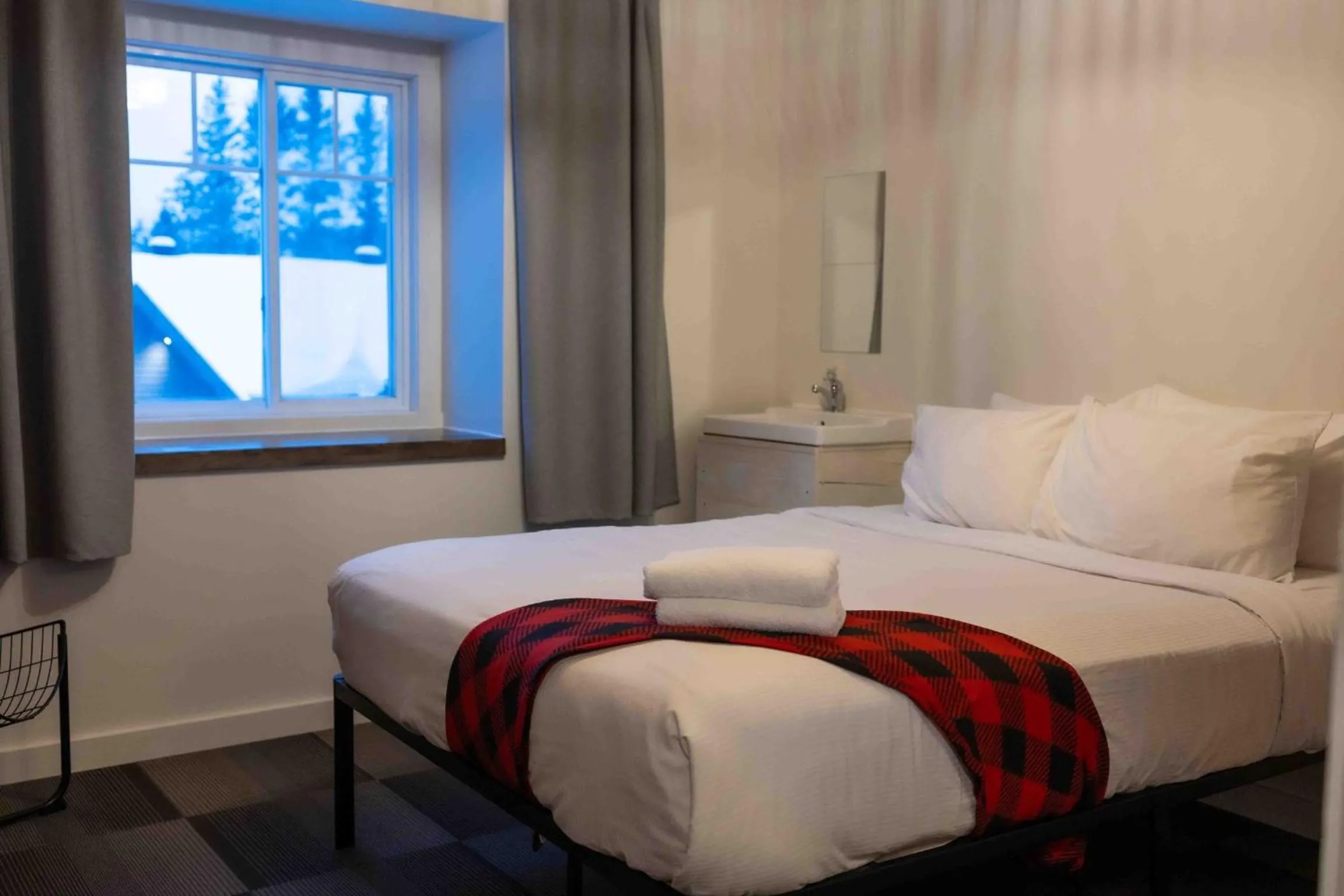 Bed in Auberge Manitonga