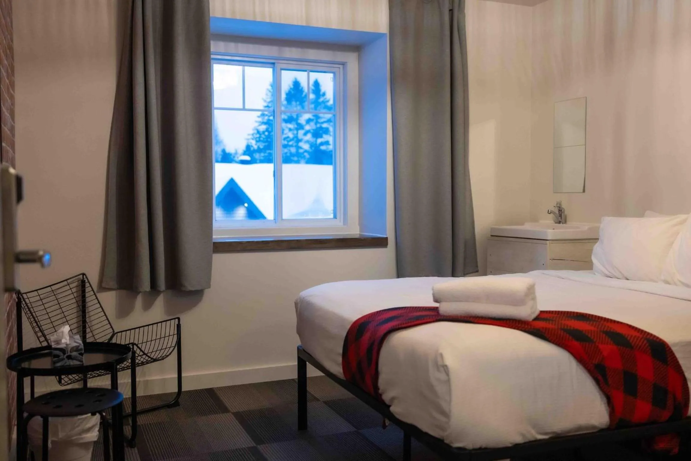 Bed in Auberge Manitonga