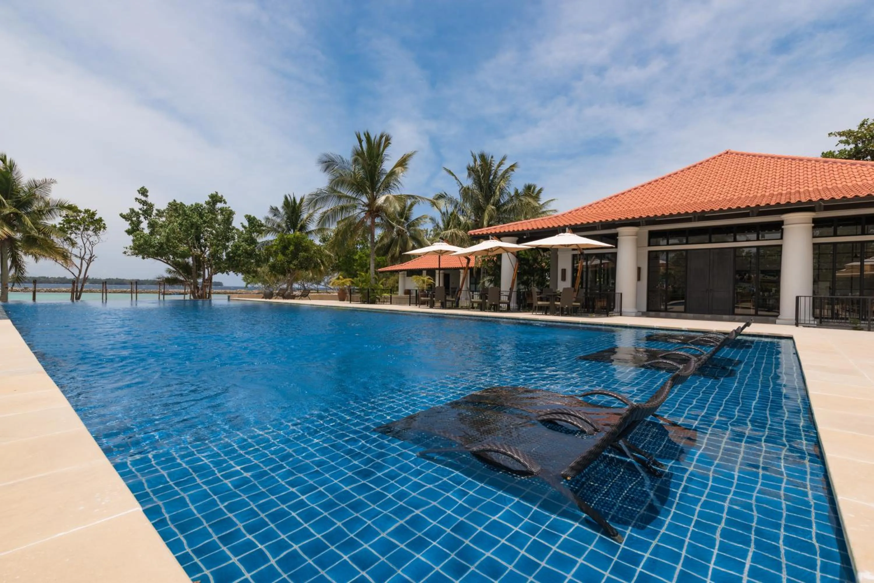 Swimming pool in Dusit Thani Lubi Plantation Resort
