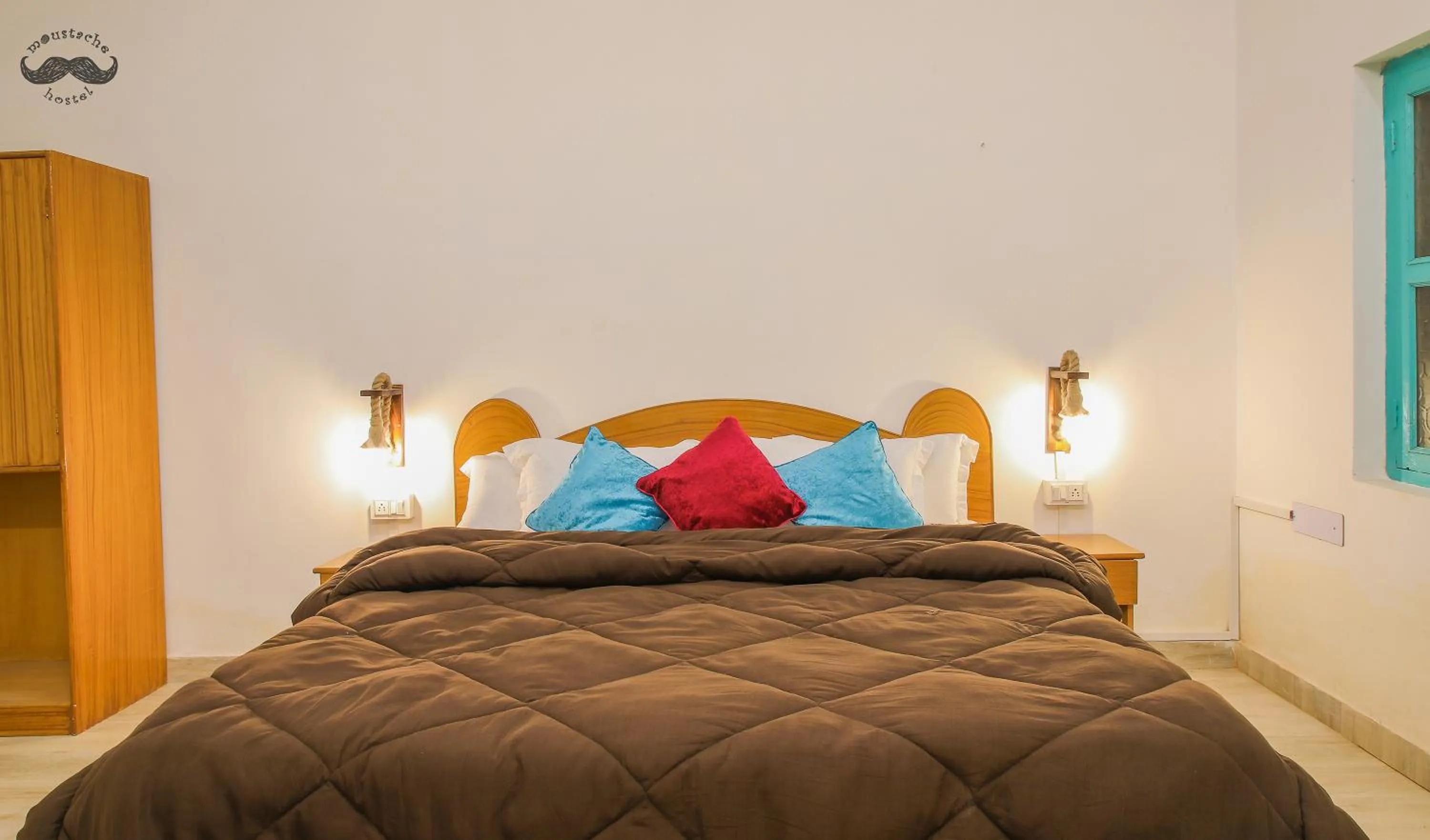 Bed in Moustache Khajuraho