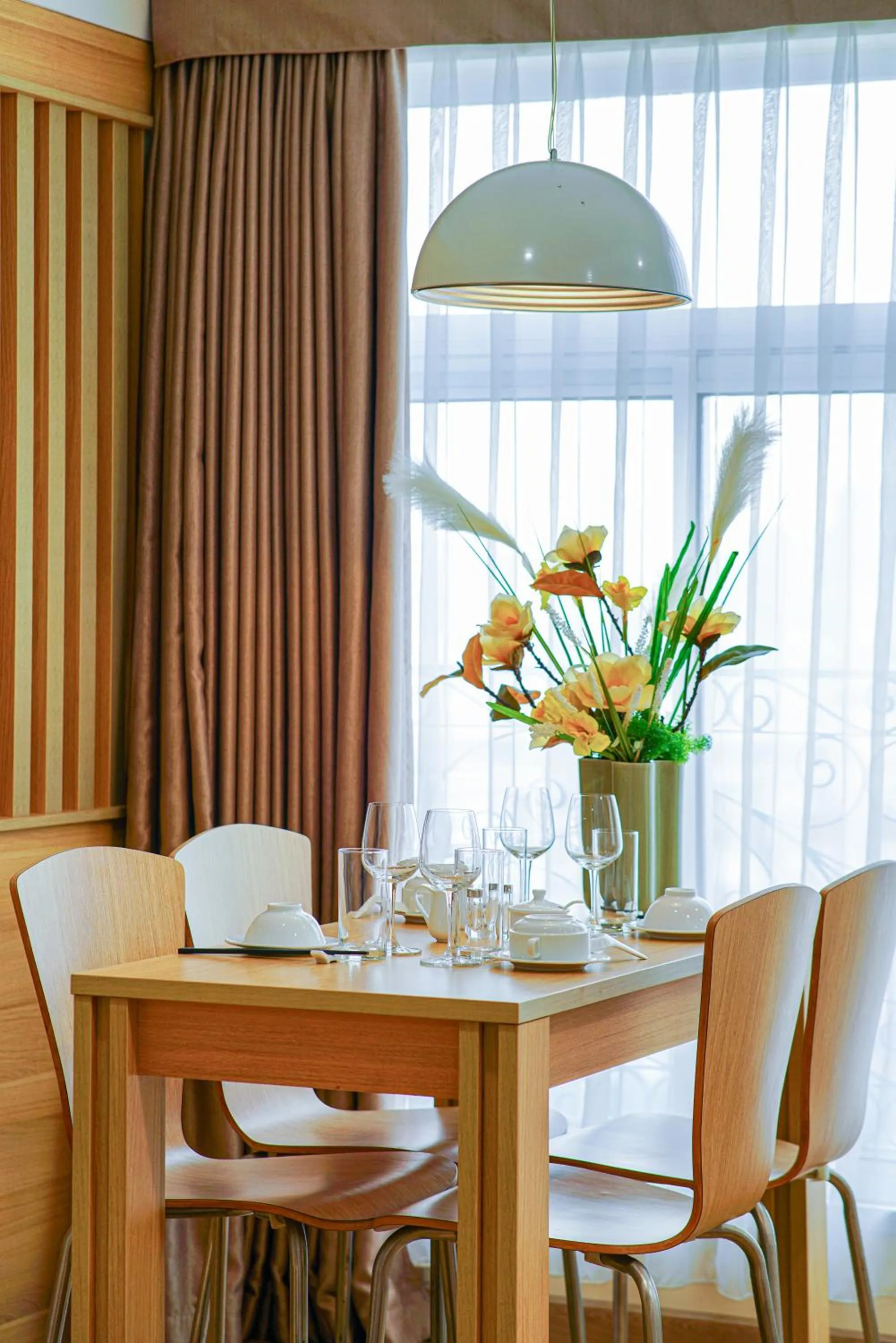 Dining area in Super Candle Hotel