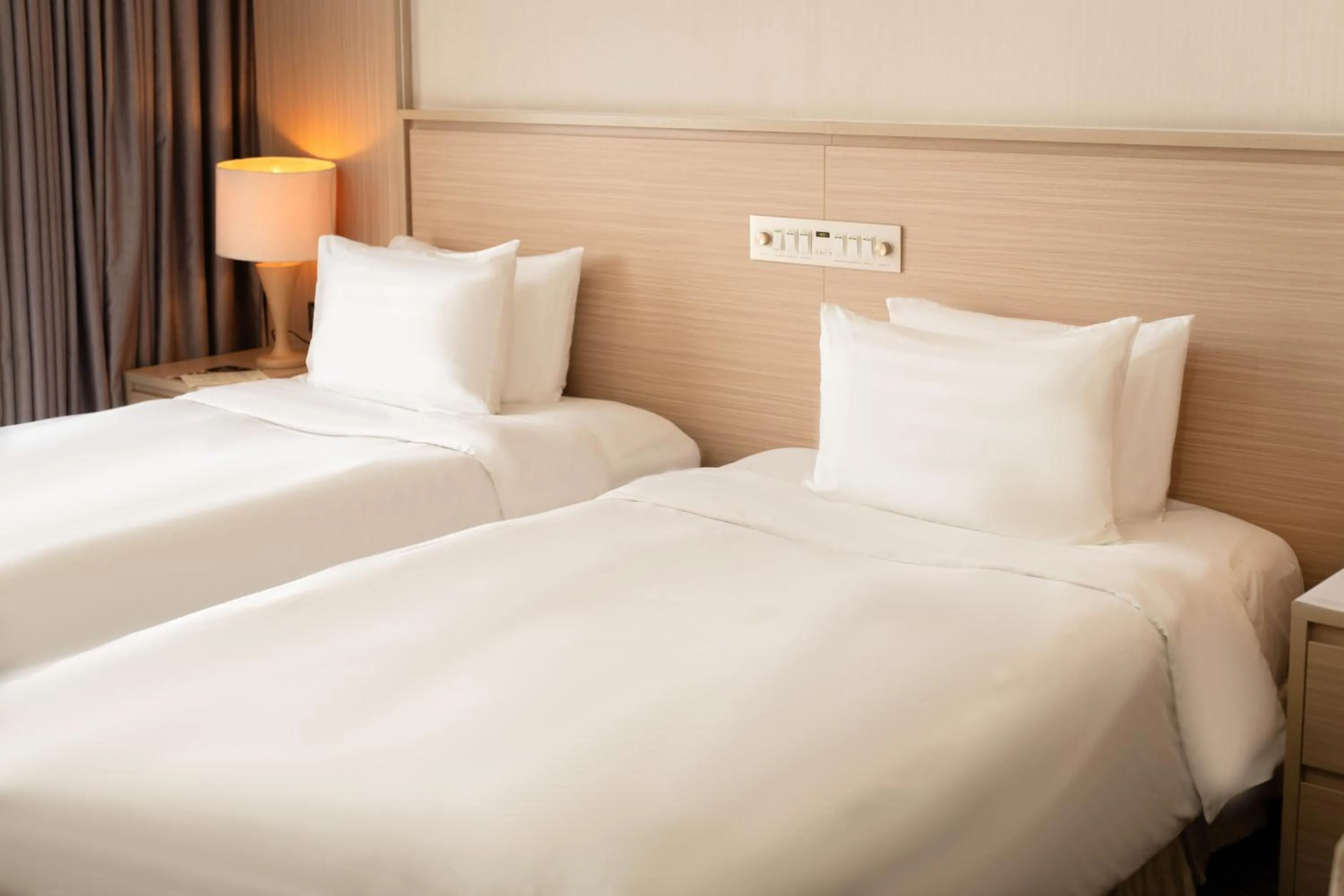 Bed in Super Candle Hotel