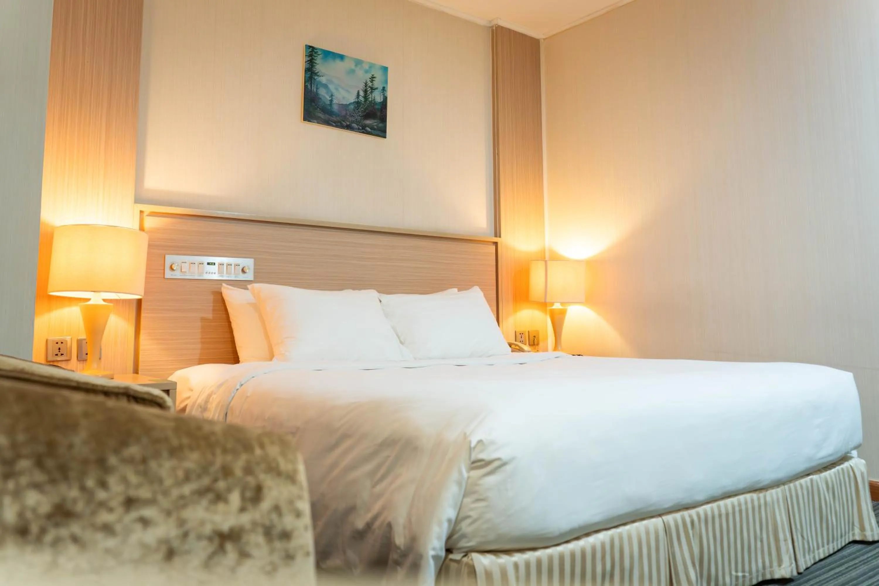 Bed in Super Candle Hotel