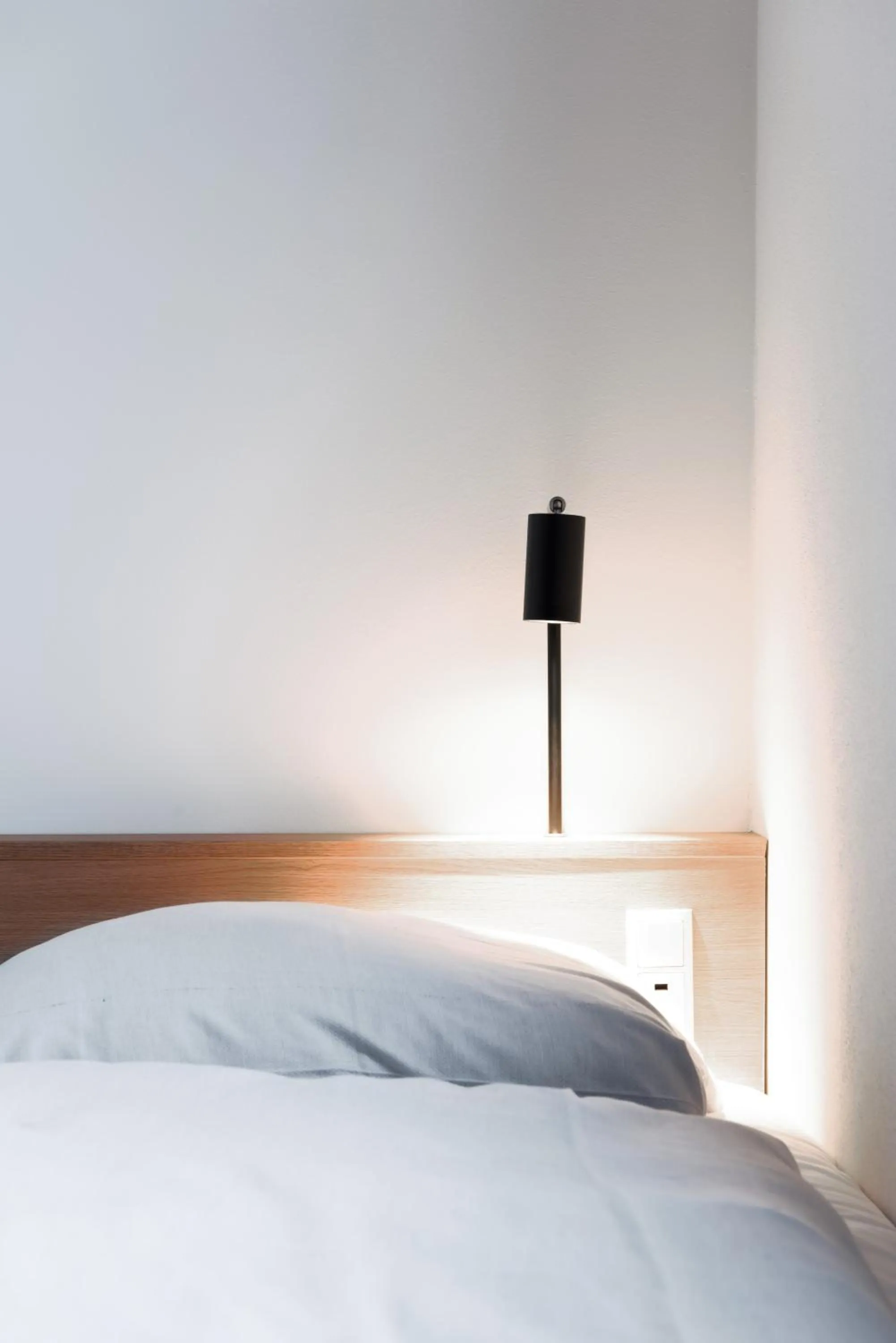 Bed in BOOK1 by Brøchner Hotels