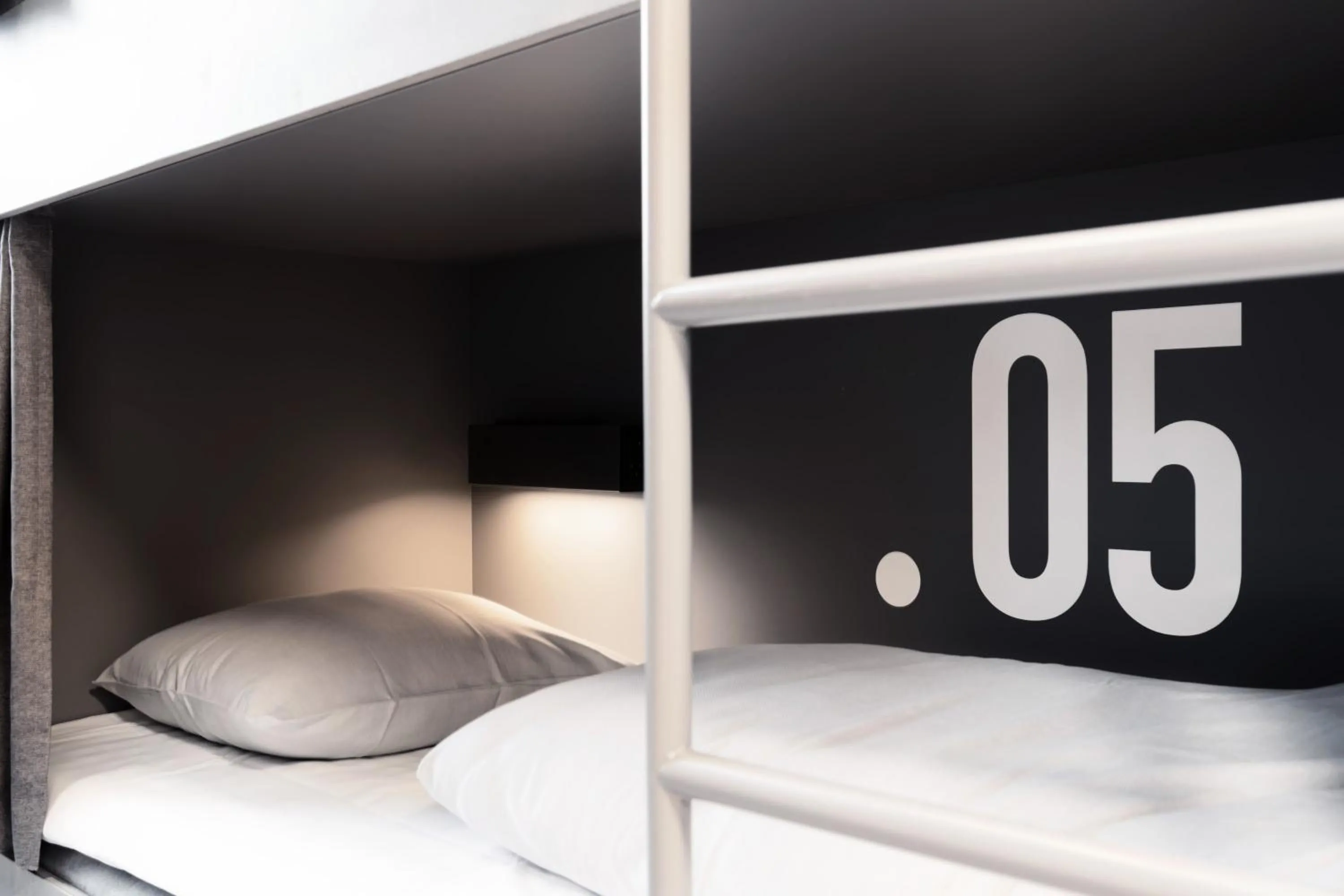 Bed in BOOK1 by Brøchner Hotels