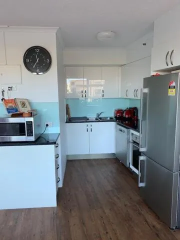 Kitchen or kitchenette in Centrepoint Apartments Caloundra