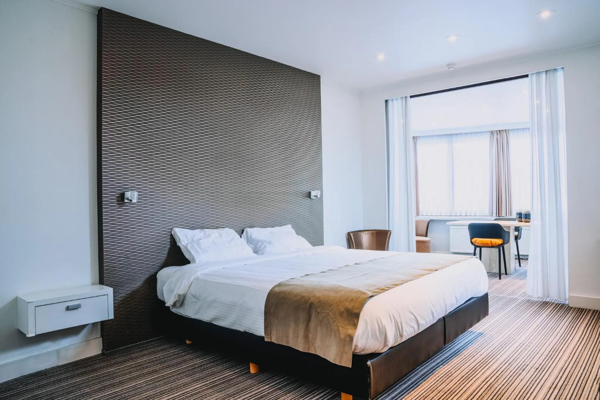 Bed in Hotel Les Eleveurs