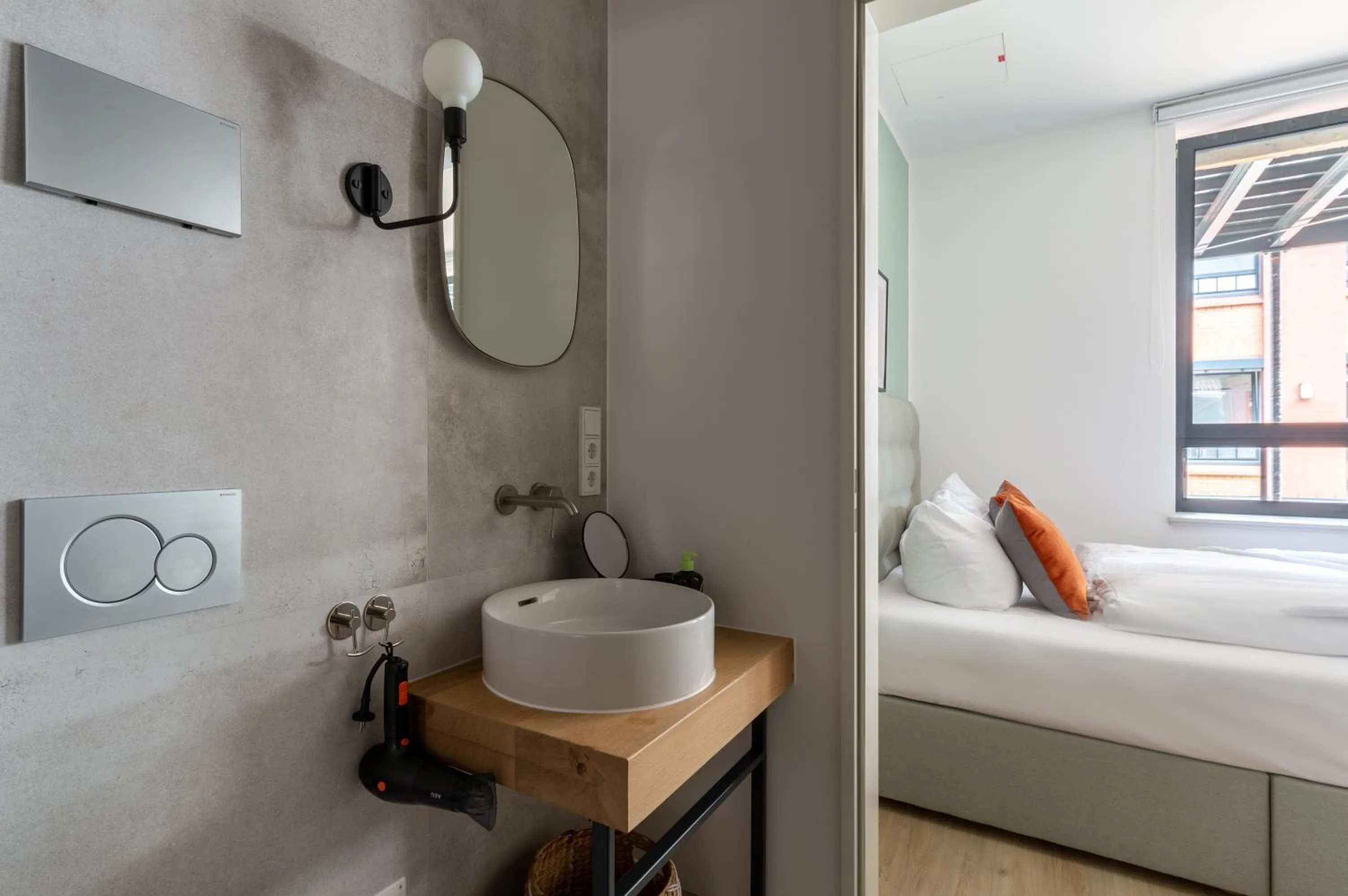 Bathroom, Bed in Limehome Flensburg Holm