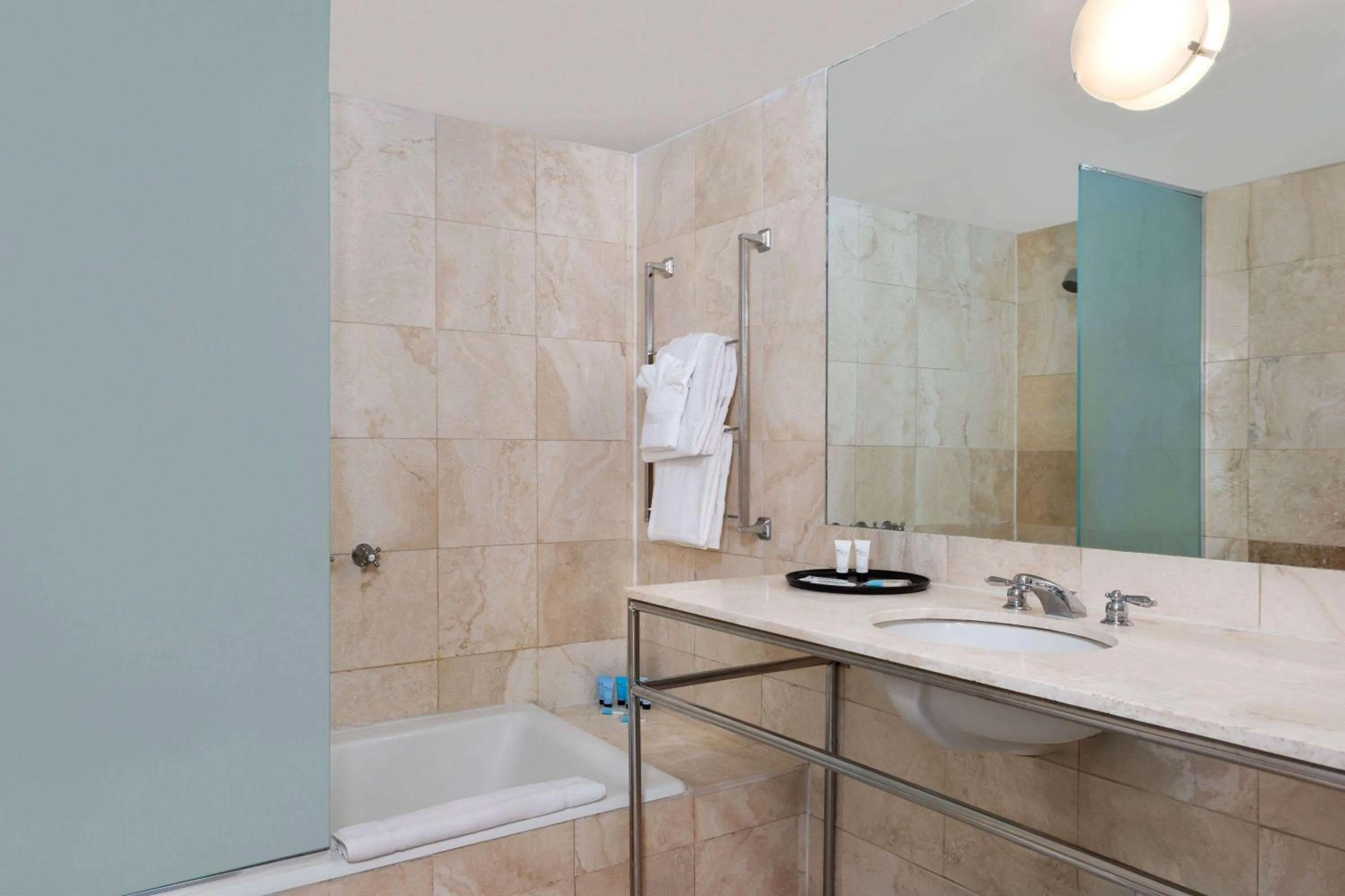 TV and multimedia, Bathroom in The Astor by LuxUrban