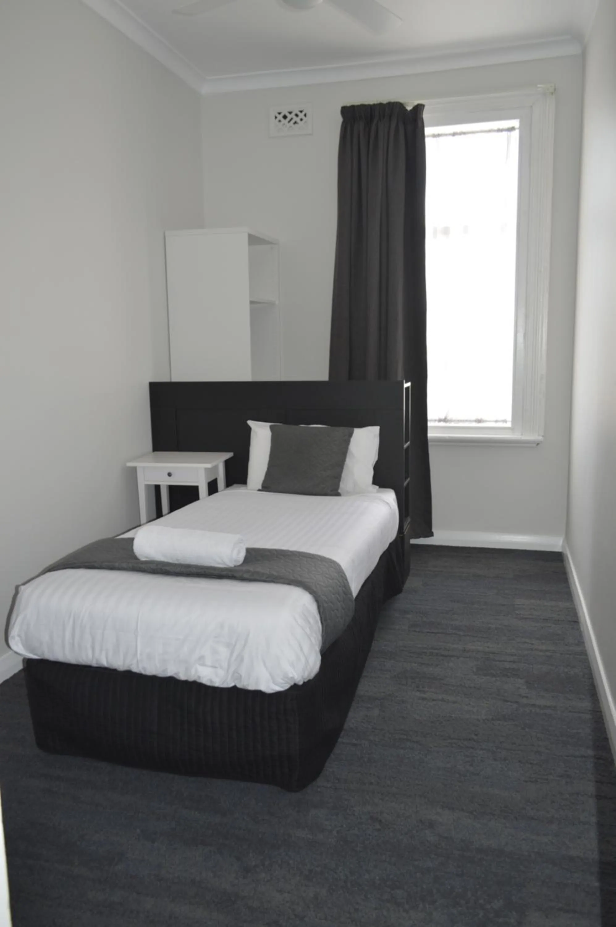 Bed in The Parade Hotel