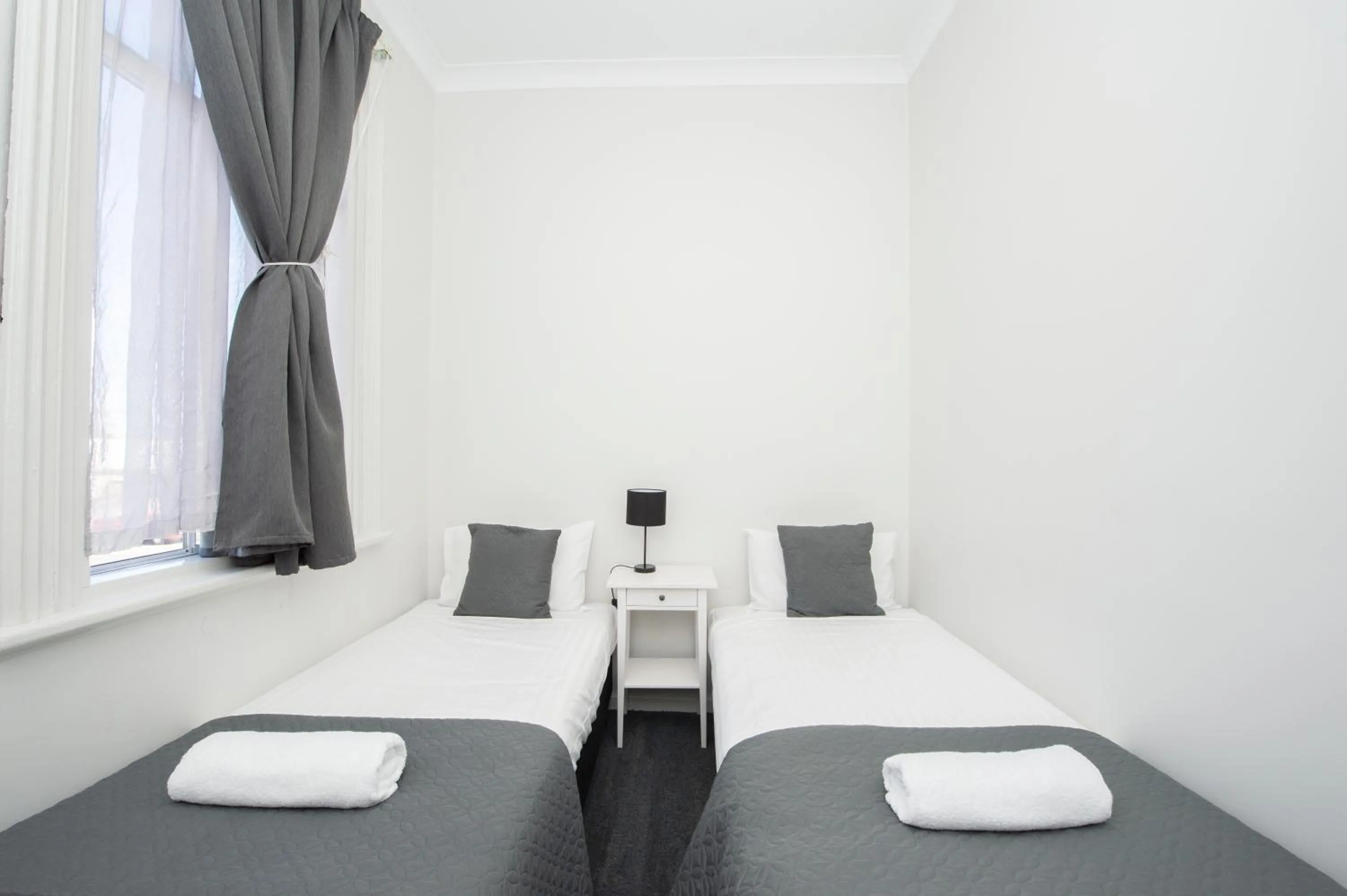 Bed in The Parade Hotel