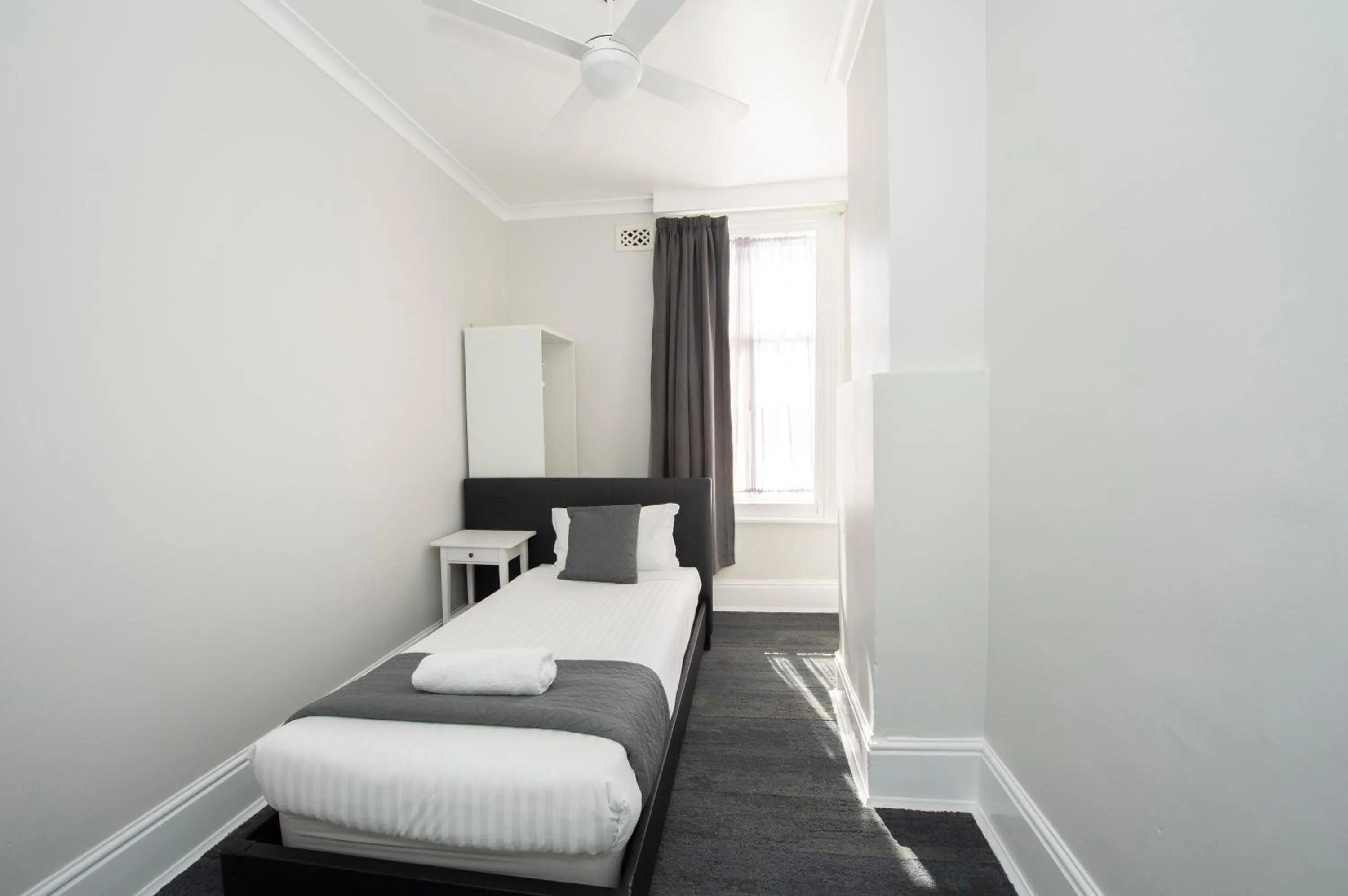 Bed in The Parade Hotel