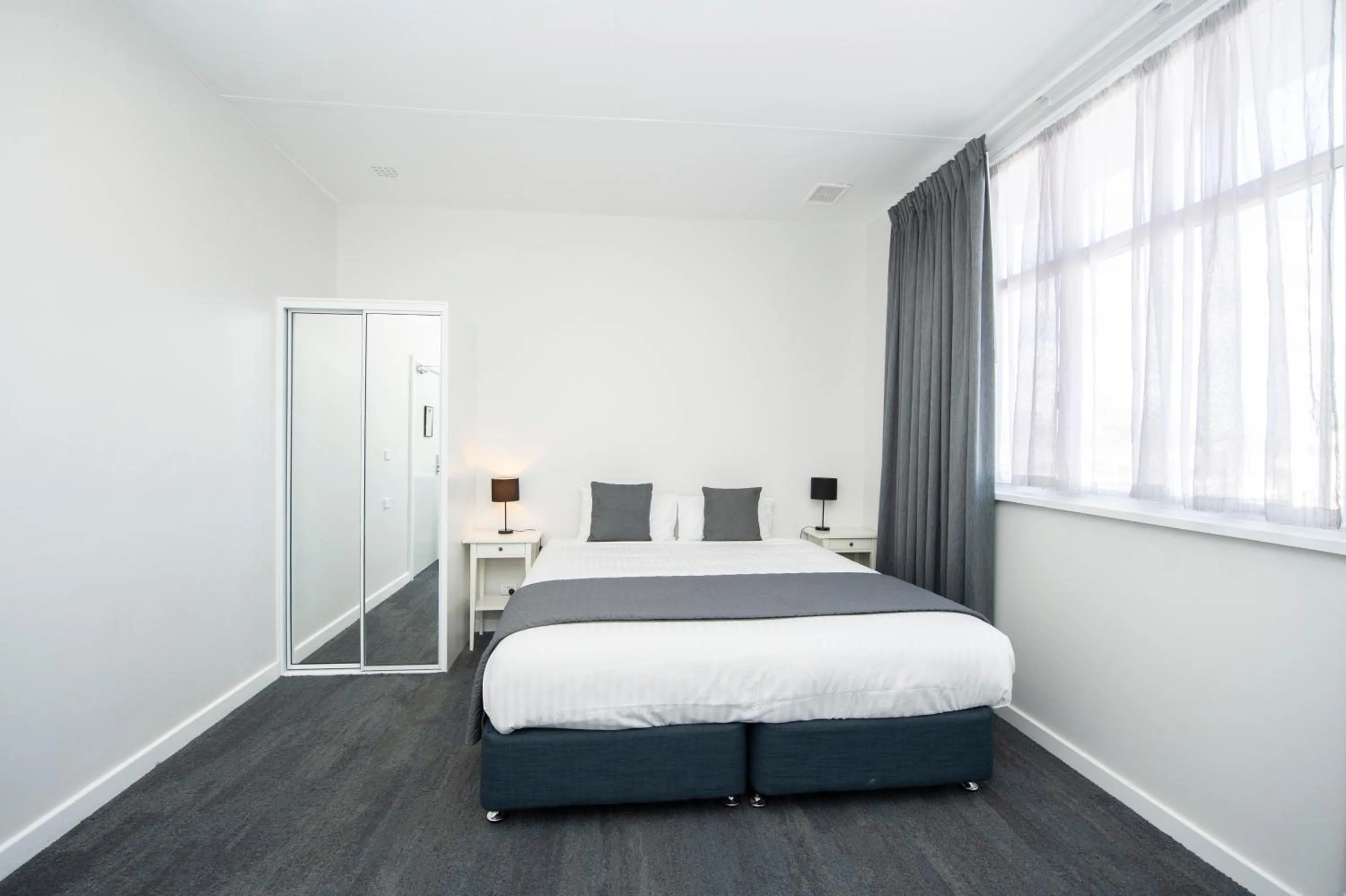 Bed in The Parade Hotel