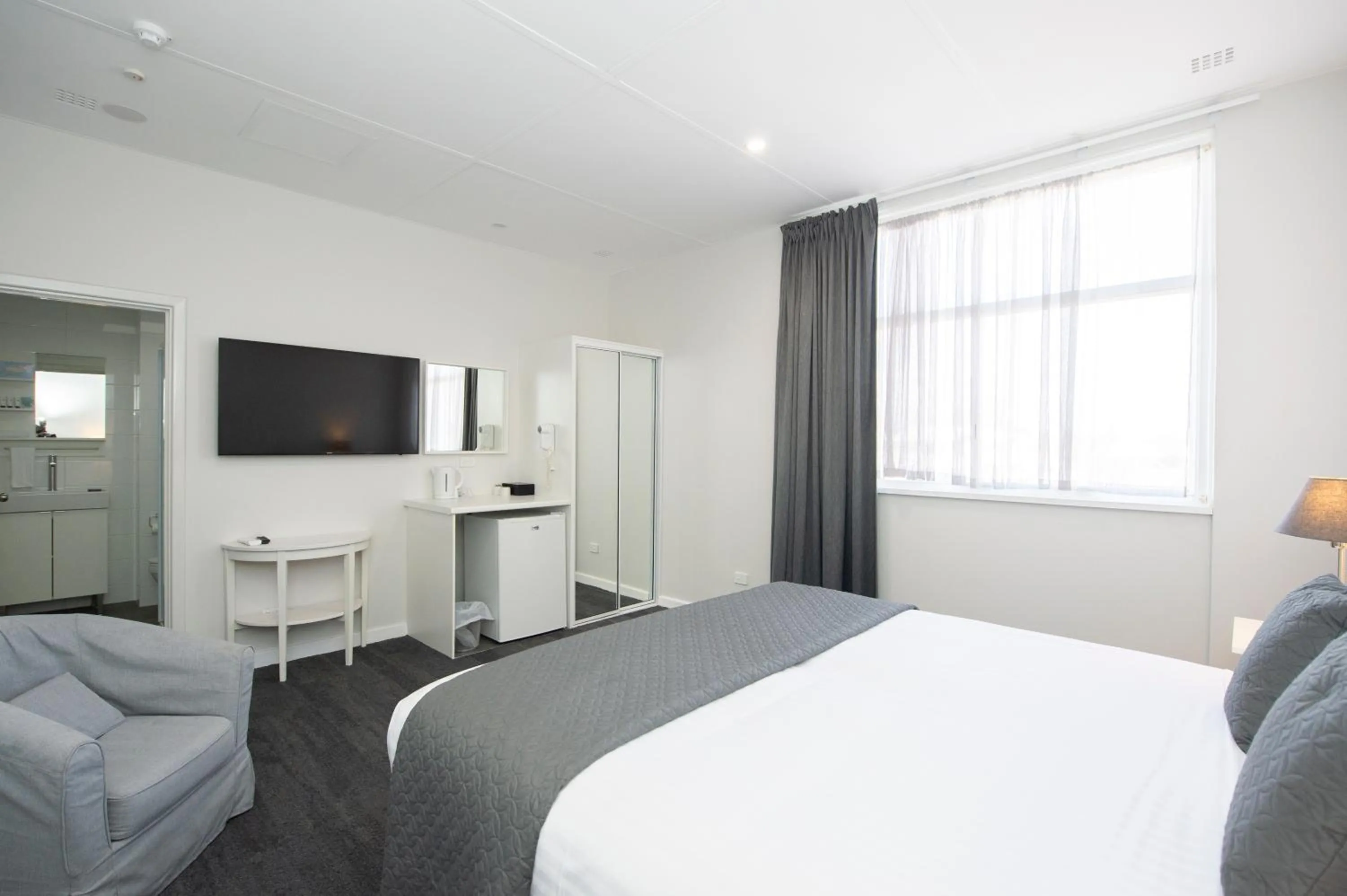 Bed in The Parade Hotel