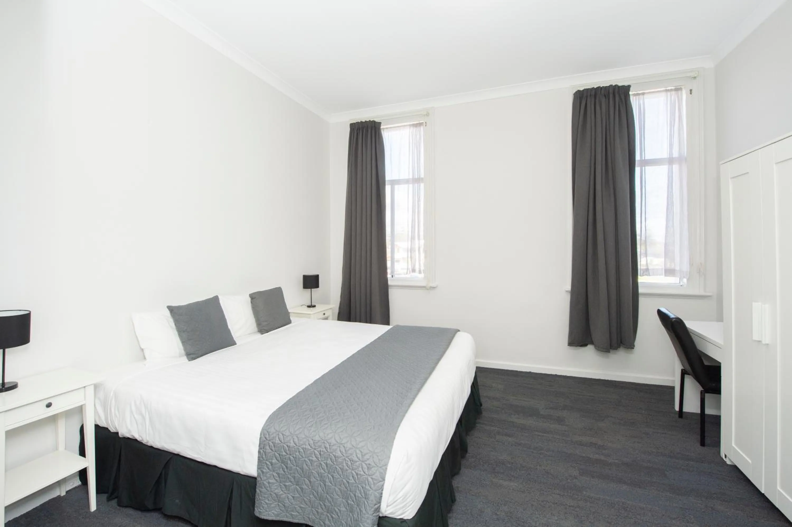 Bed in The Parade Hotel