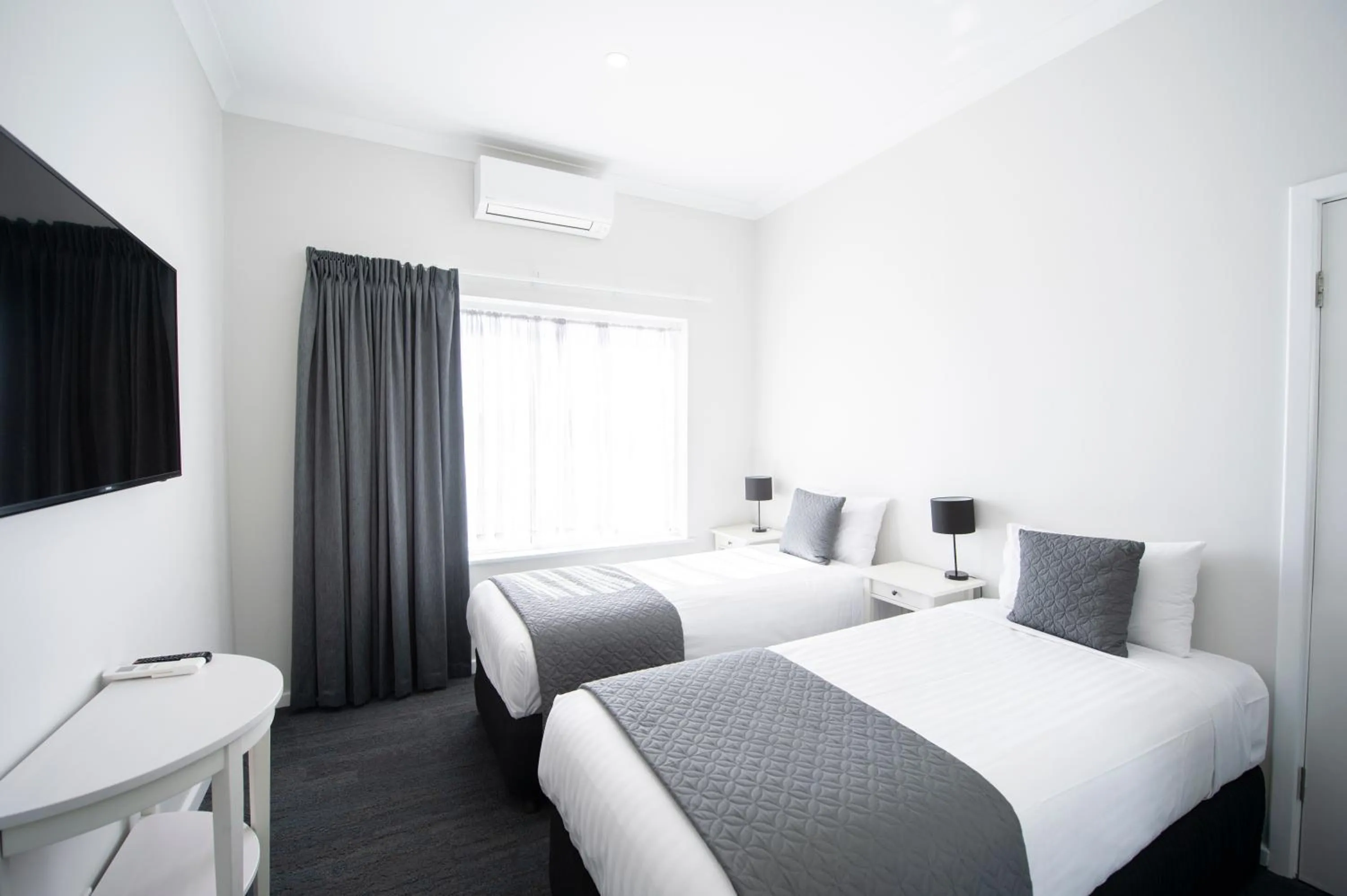 Bed in The Parade Hotel