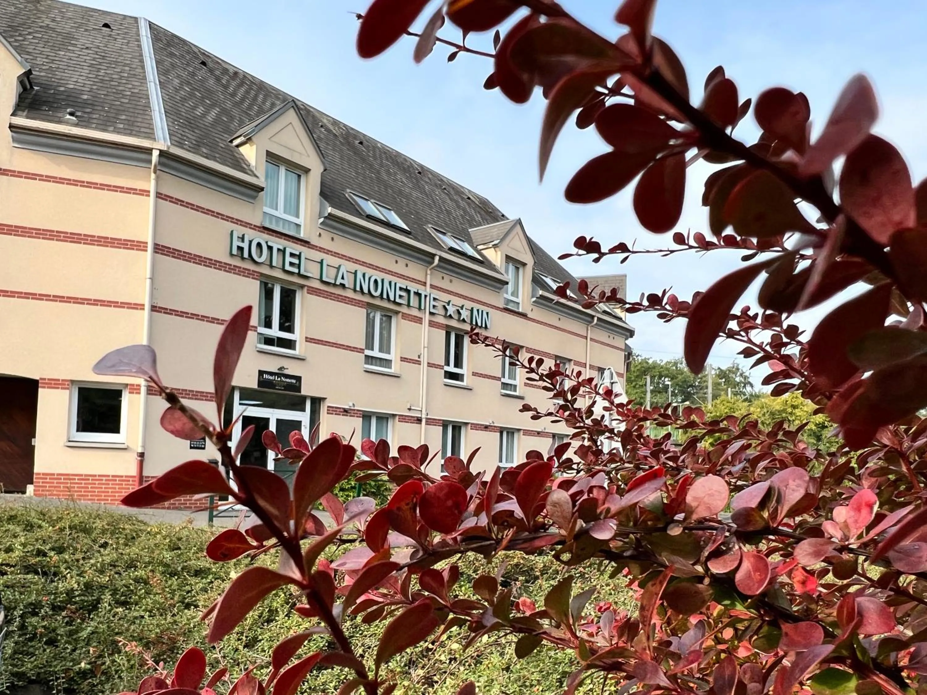 Property building in Hôtel La Nonette ASTERIX, CDG AIRPORT & PARIS CENTRE
