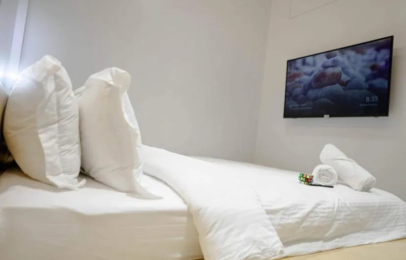 TV and multimedia, Bed in Radlett Residences Hotel - Tuguegarao