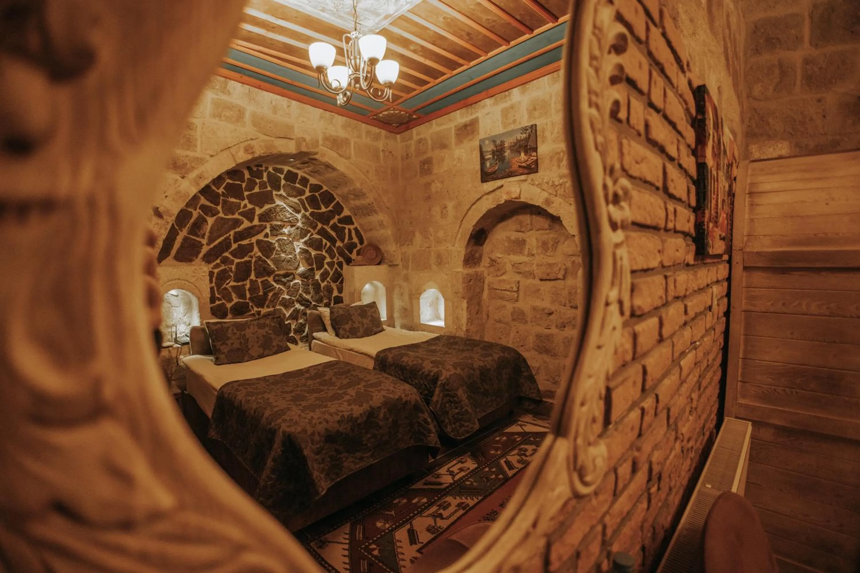 Bed in Vintage Cave House Hotel