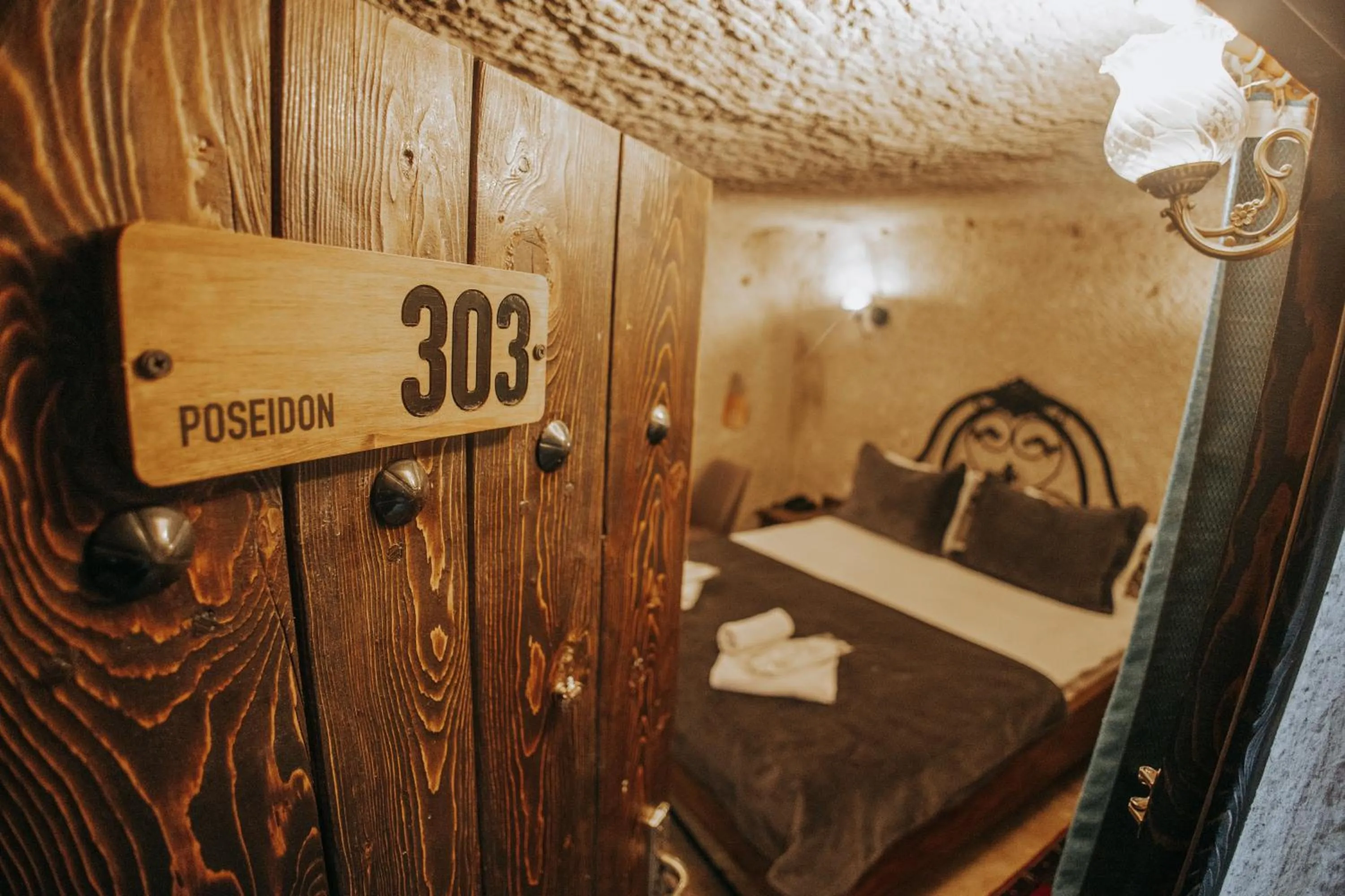 Bed in Vintage Cave House Hotel