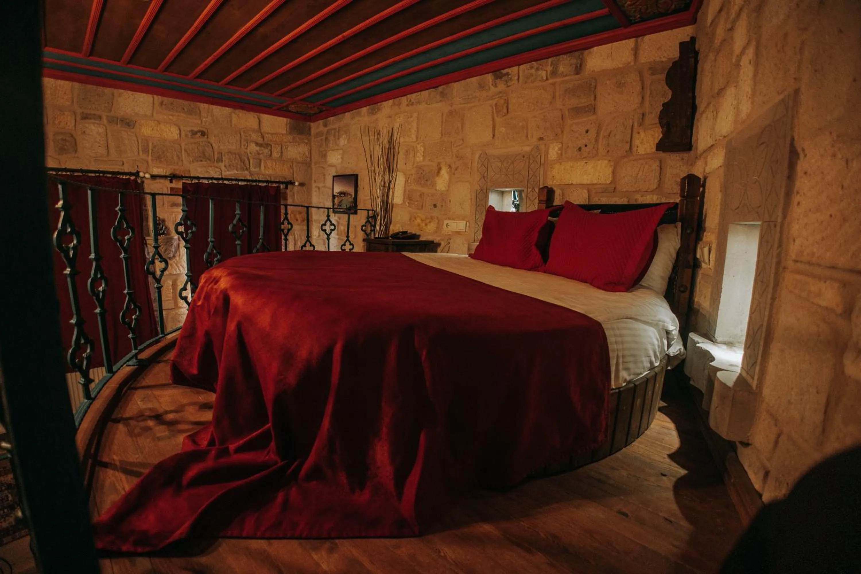 Bed in Vintage Cave House Hotel